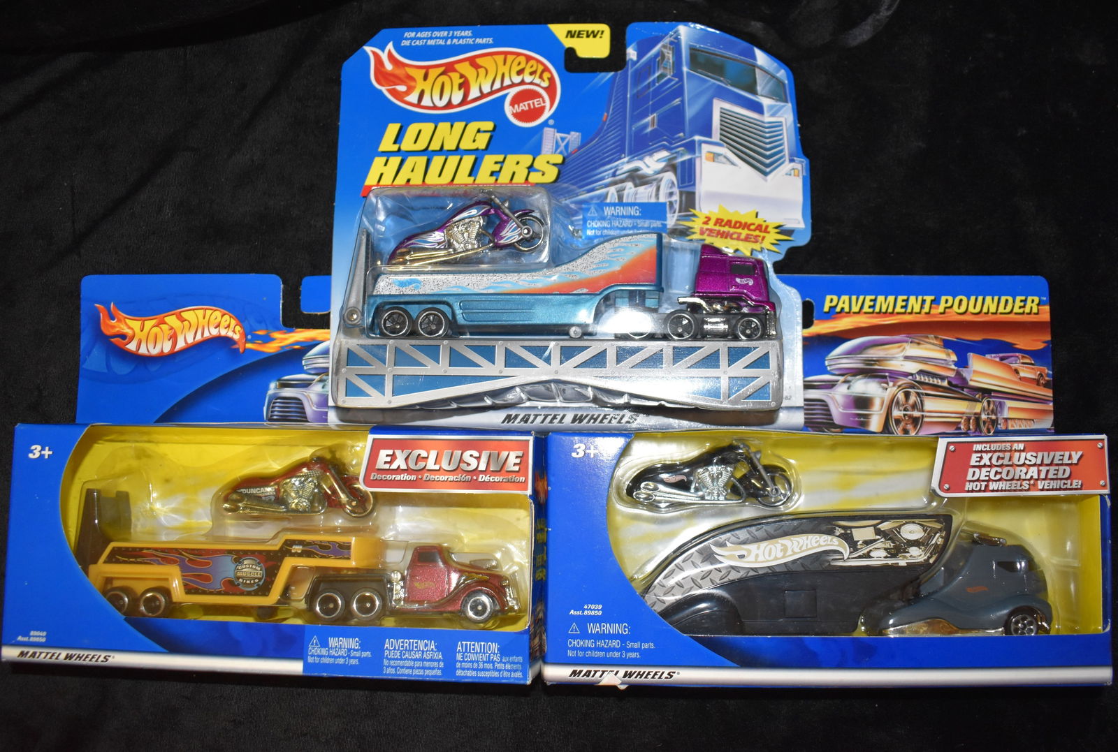 Hot Wheels Long Haulers over the Road Power Transporter & Two Pavement Pounders: Hot Wheels Long Haulers over the Road Power Transporter & Two Pavement Pounders w/ Motorcycles 1998-2001. New in their original boxes.