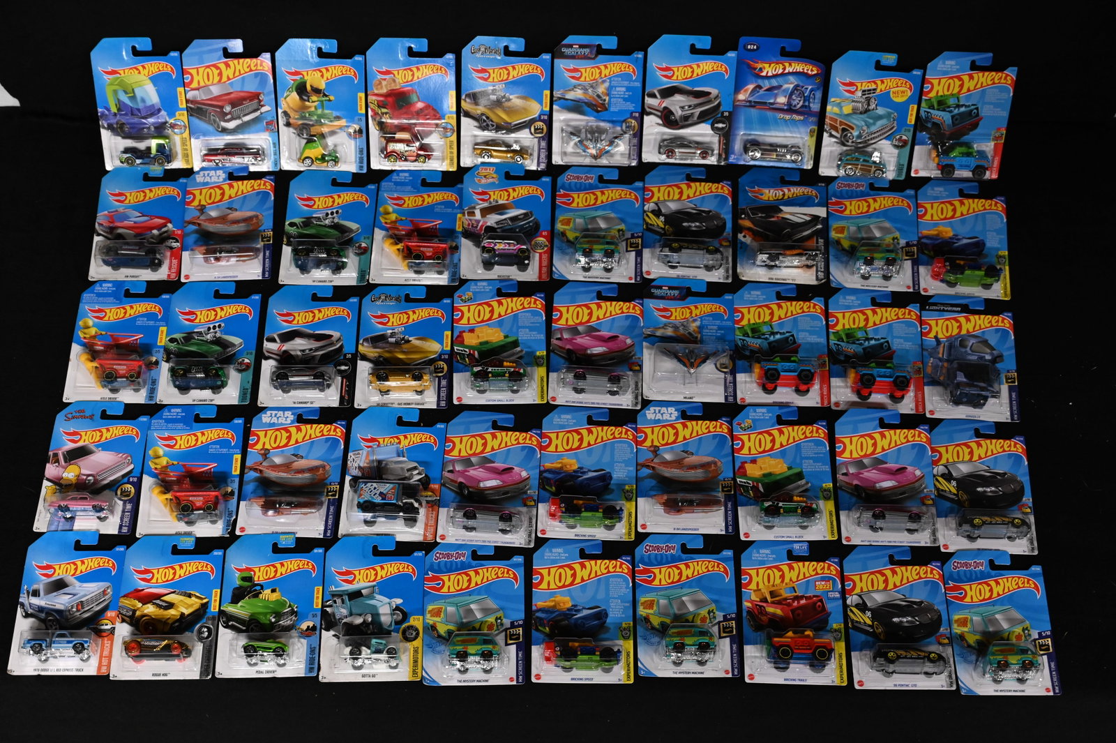 Mattel Hot Wheels Assortment of 50 cars 1993-2021 All cars are brand new and in the original card.: Mattel Hot Wheels Assortment of 50 cars 1993-2021 All cars are brand new and in the original card. The dates will range so please look at the pictures for condition and age of each car.