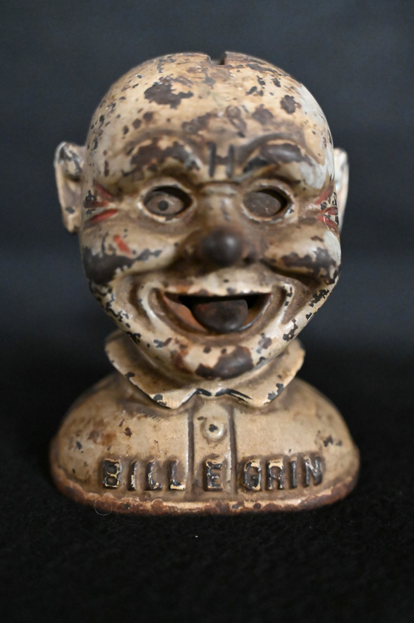 Cast Iron Bill E Grin Coin Bank Produced by The J.E. Stevens Co. Circa 1915. (1 of 6)