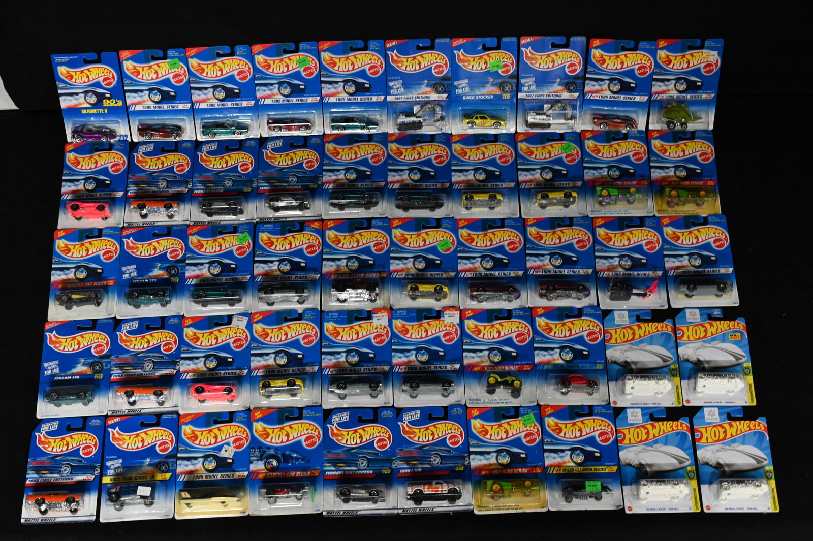 Mattel Hot Wheels Assortment of 50 cars 1993-2021 All cars are brand new and in the original card.: Mattel Hot Wheels Assortment of 50 cars 1993-2021 All cars are brand new and in the original card. The dates will range so please look at the pictures for condition and age of each car.