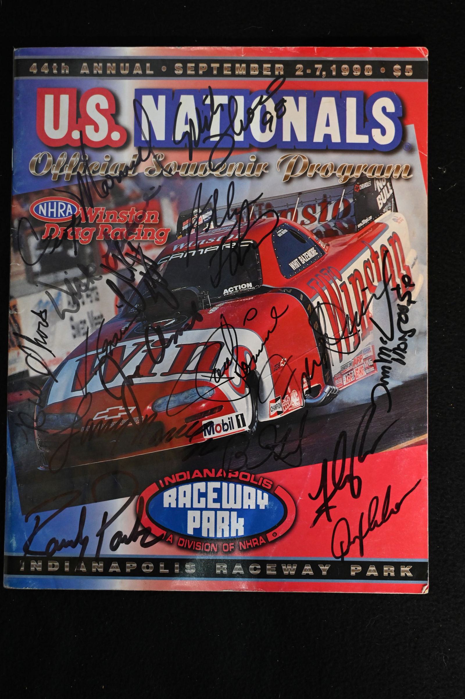 44th Annual U.S. Nationals Official Souvenir Program 1998 NHRA with over 20 signatures.  Includes (1 of 4)
