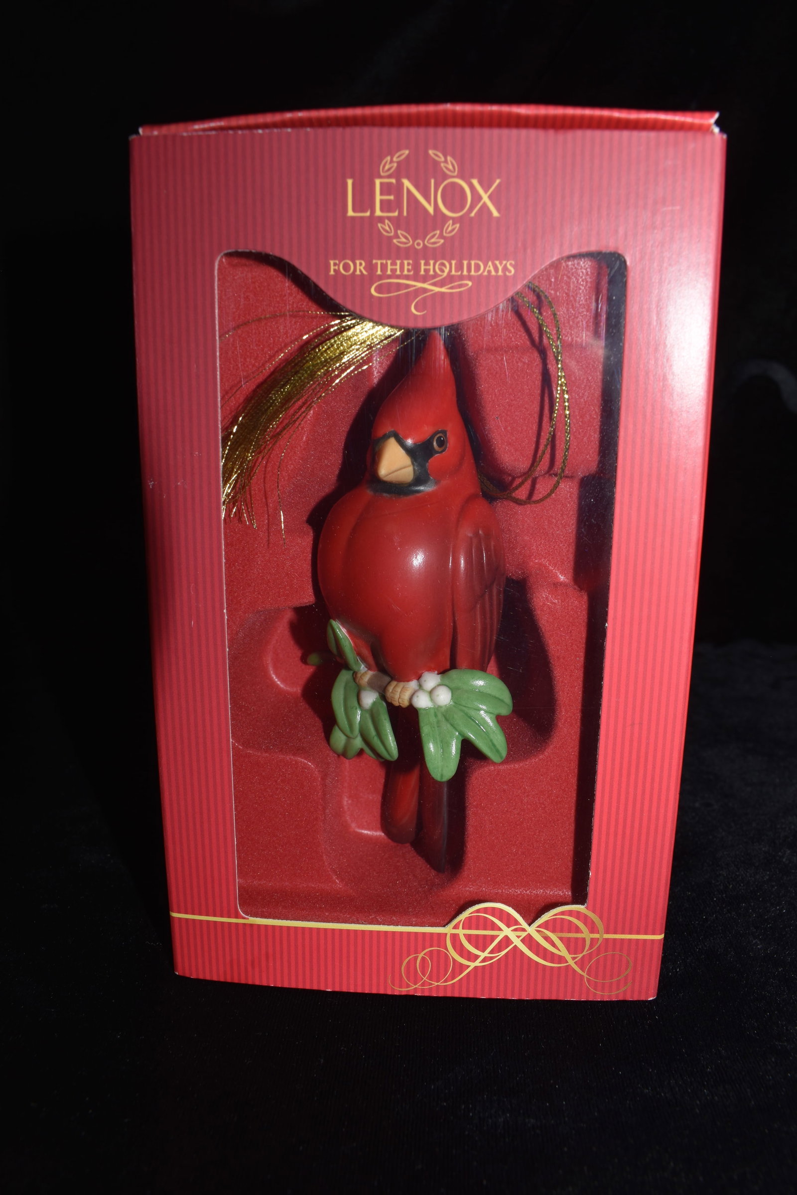 LENOX CHRISTMAS CARDINAL BIRD ORNAMENT: LENOX CHRISTMAS CARDINAL BIRD ORNAMENT. New condition in its original box. Measures 4 1/2" tall