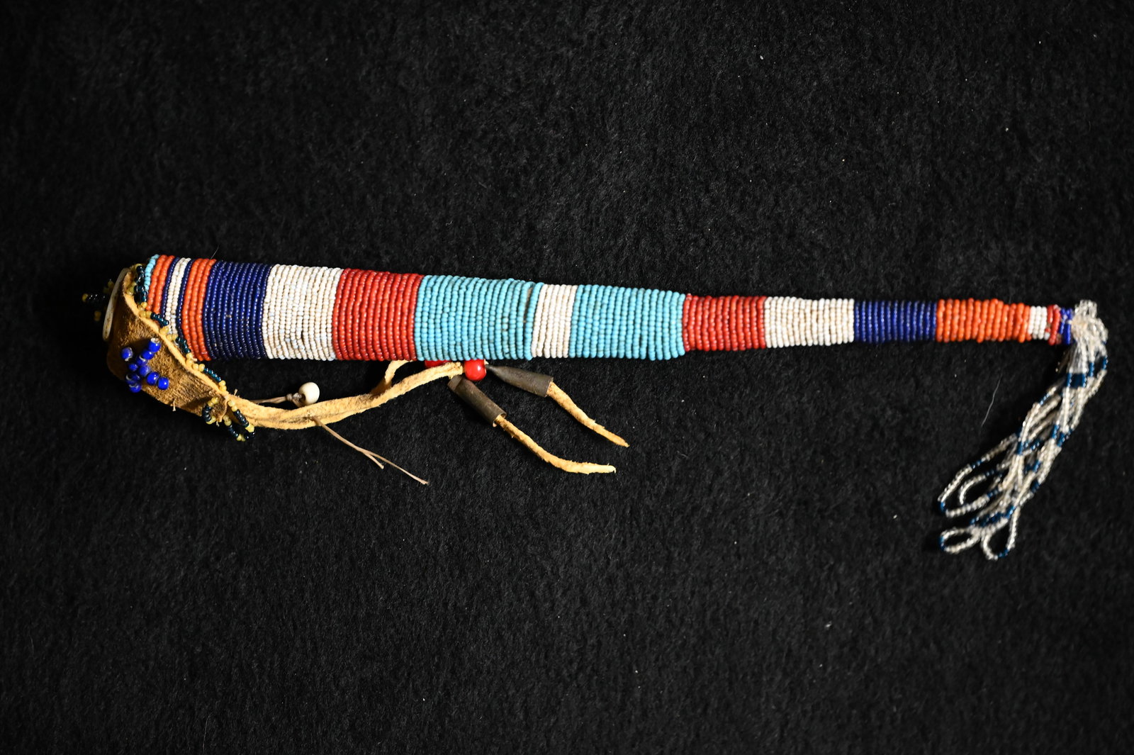 Sioux Beaded Awl Case w/Bone Awl Inside: Sioux Beaded Awl Case w/Bone Awl Inside. Lots of nice beadwork on this case that measures 10 1/2 inches long. The bone awl is in great condition and measures 6 inches long.