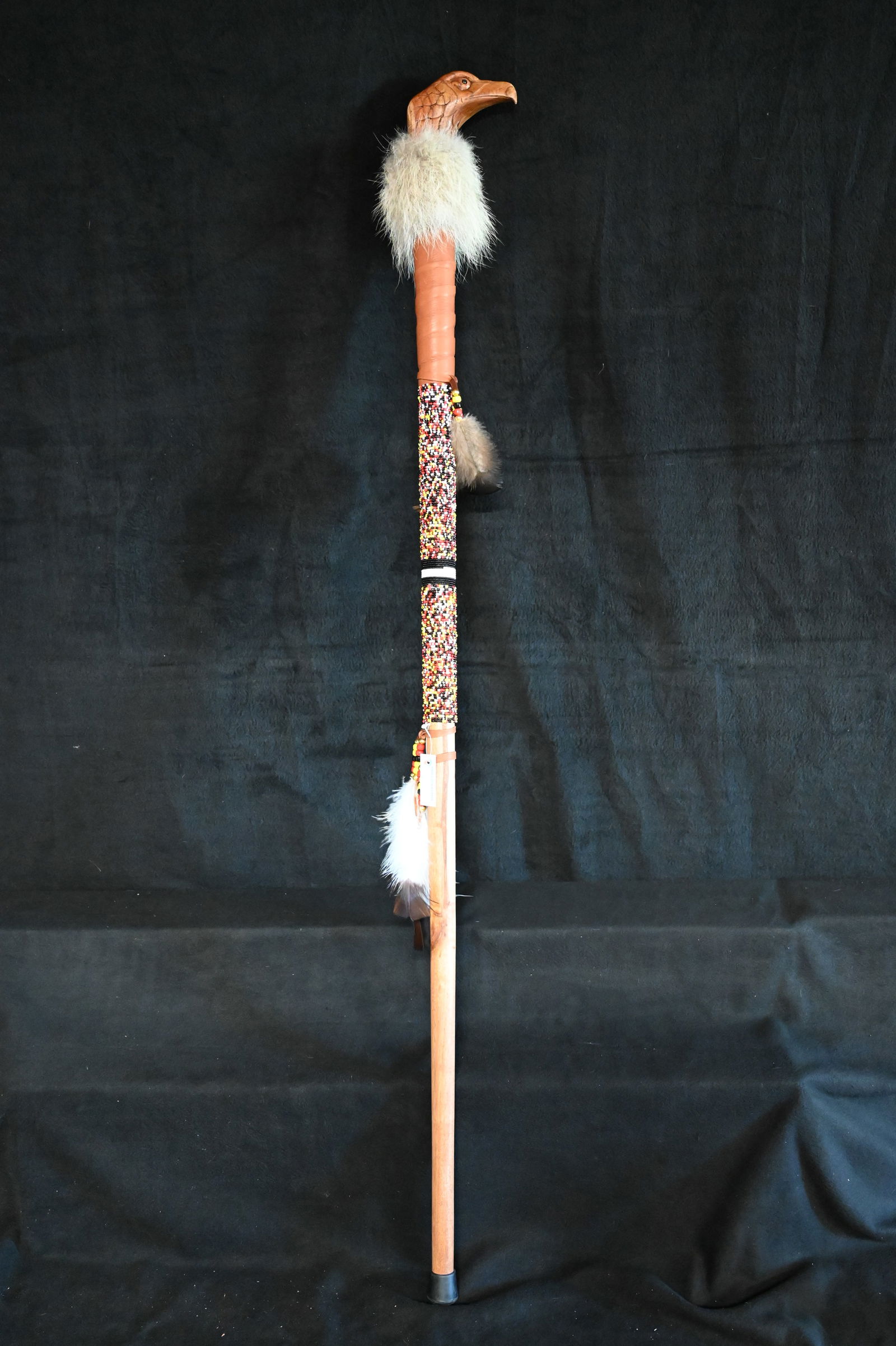 Buzzard Death Cane measures 51 inches long. Hand Crafted by Native Americans Ex:: Buzzard Death Cane measures 51 inches long. Kind of looked like an eagle head to us but someone in the crowd enlightened us that this is actually a Buzzard Death Cane. Hand Crafted by Native Americans
