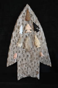 9 Modern Arrowheads Displayed on an Arrowhead Shaped Board.  The longest arrowhead measures 3 15/16: 9 Modern Arrowheads Displayed on an Arrowhead Shaped Board. The longest arrowhead measures 3 15/16 inches long. The board is 11 1/4' x 19".