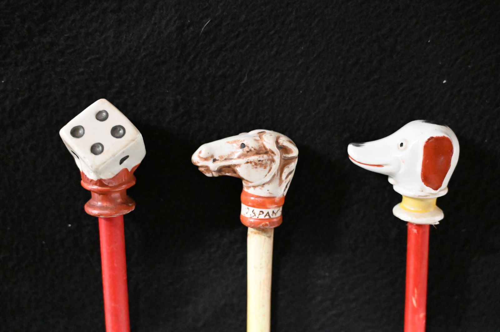3 Carnival Canes with a Ceramic/Porcelain Top of Dice, Horse &  Dog figures on top and a wood rod. (1 of 6)