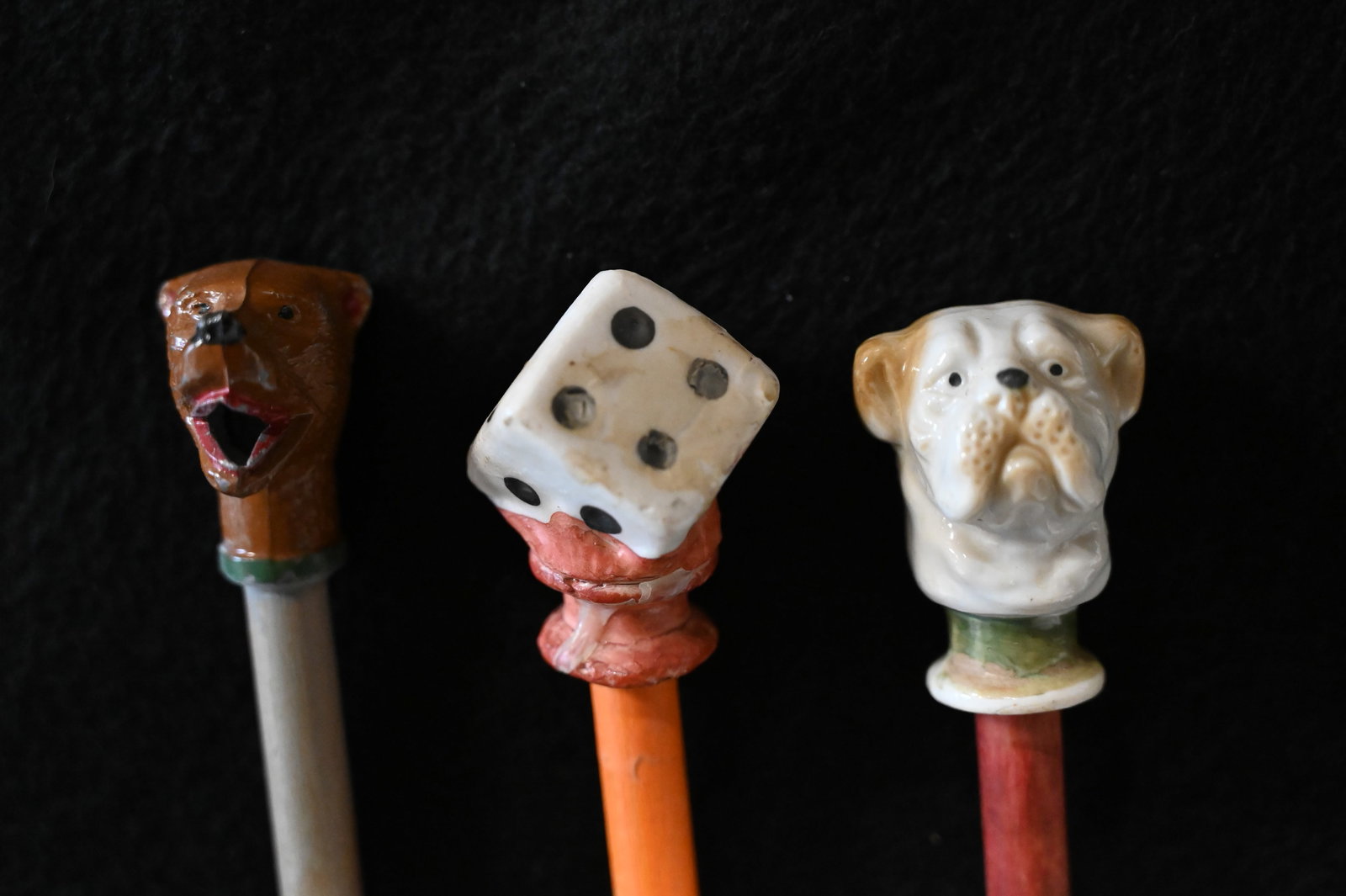 3 Carnival Canes with a Ceramic/Porcelain Top of Dice, Bear &  Dog figures on top and a wood rod. (1 of 5)