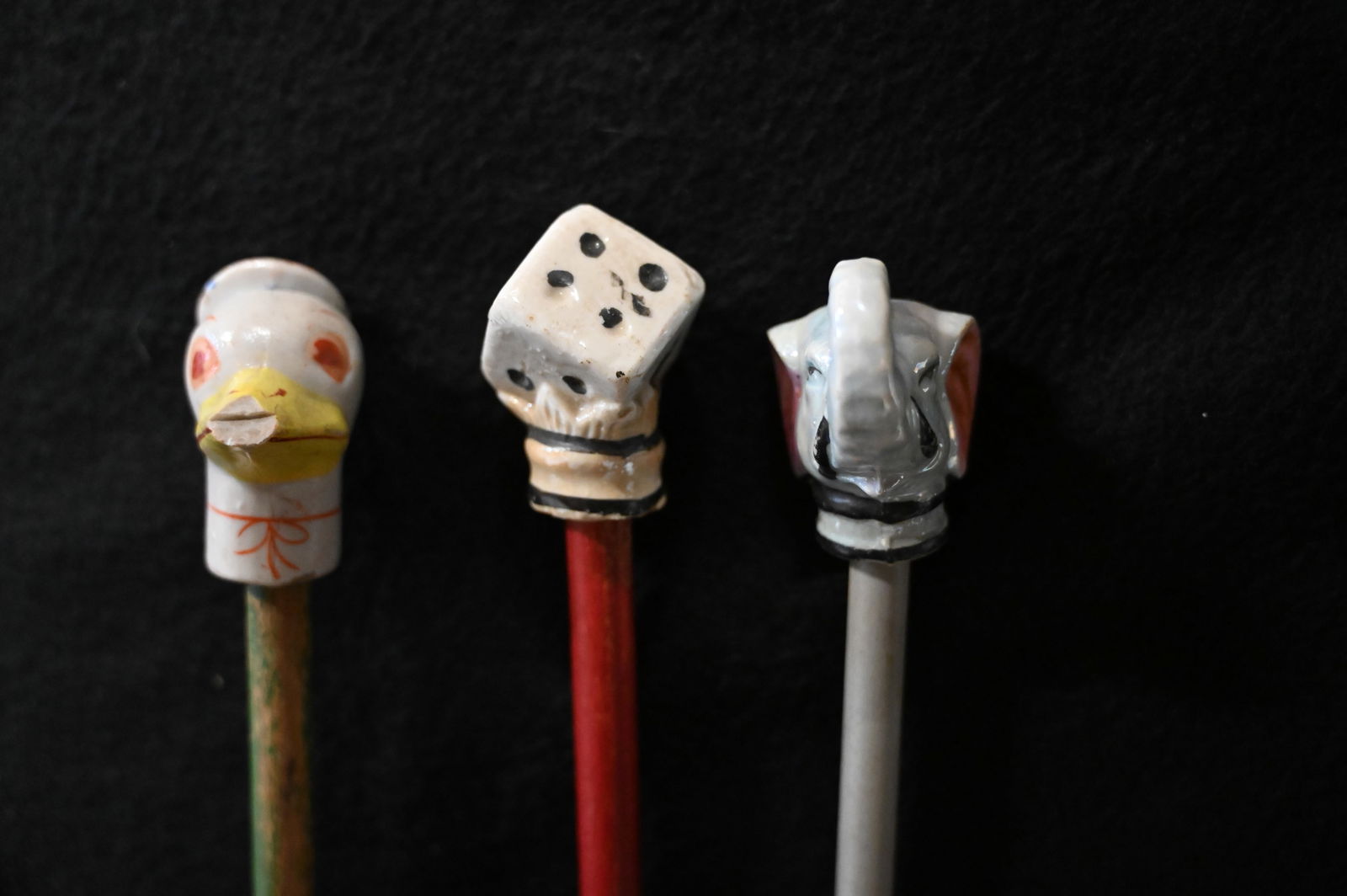 3 Carnival Canes with a Ceramic/Porcelain Top of Dice, Duck &  Elephant figures on top and a wood (1 of 4)