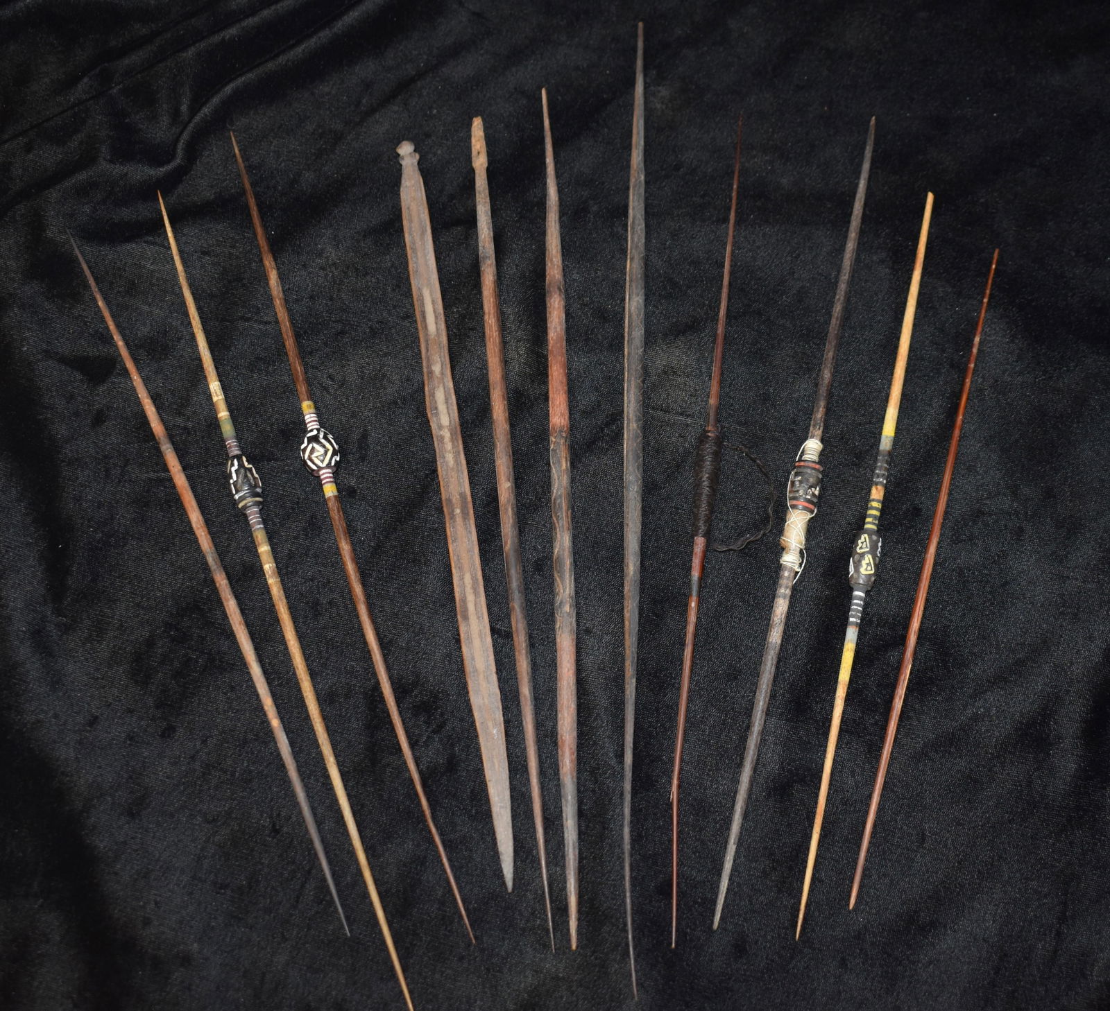 Lot of 11 Chancay Wood Needles & Pottery Spindle Whorls: Lot of 11 Chancay Wood Needles & Pottery Spindle Whorls. 19th Century Peru. These old wood needles measure 10 3/8 to 15 1/4"