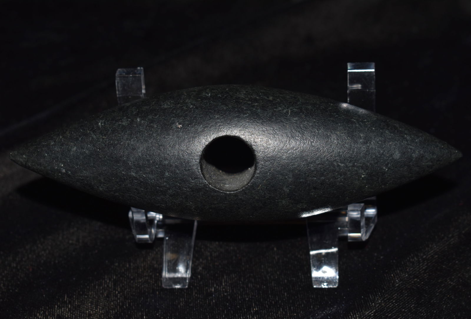 5 1/4" Neolithic Bipointed Warring Mace Head found in North Africa: 5 1/4" Neolithic Bipointed Warring Mace Head. A deadly mace this artifact is made of a very hard granite. In ancient times maces like this were likely kept as a strong deterrent to protect the wielder