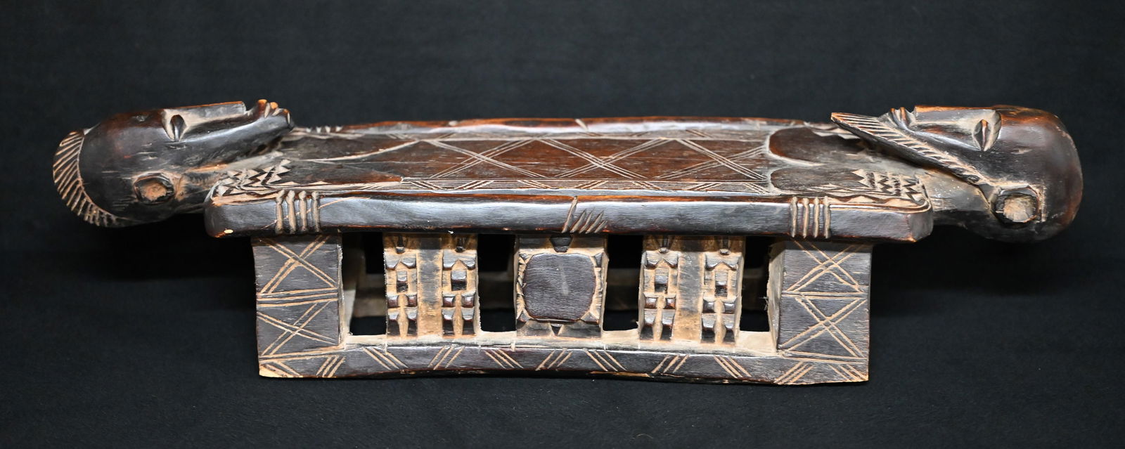 Dogon Carved Wood Marriage Stool 20th Century.  The forms on either side of the stool represent a (1 of 10)