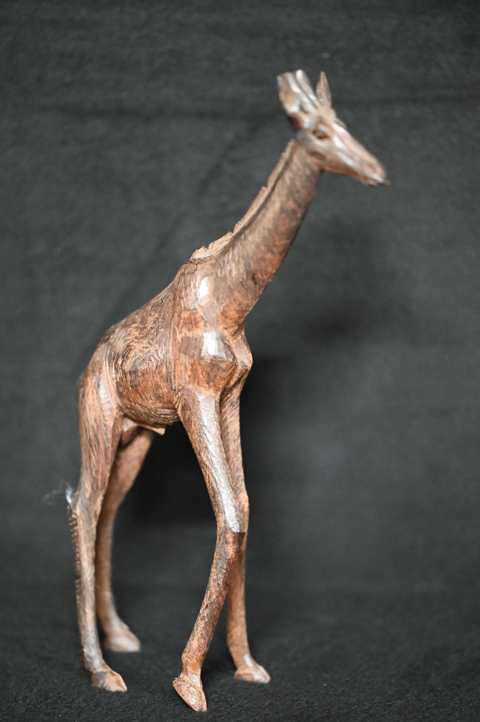 Ebony Wood Hand Carved Giraffe Statue From Africa stands 10 1/2 inches tall. (1 of 7)