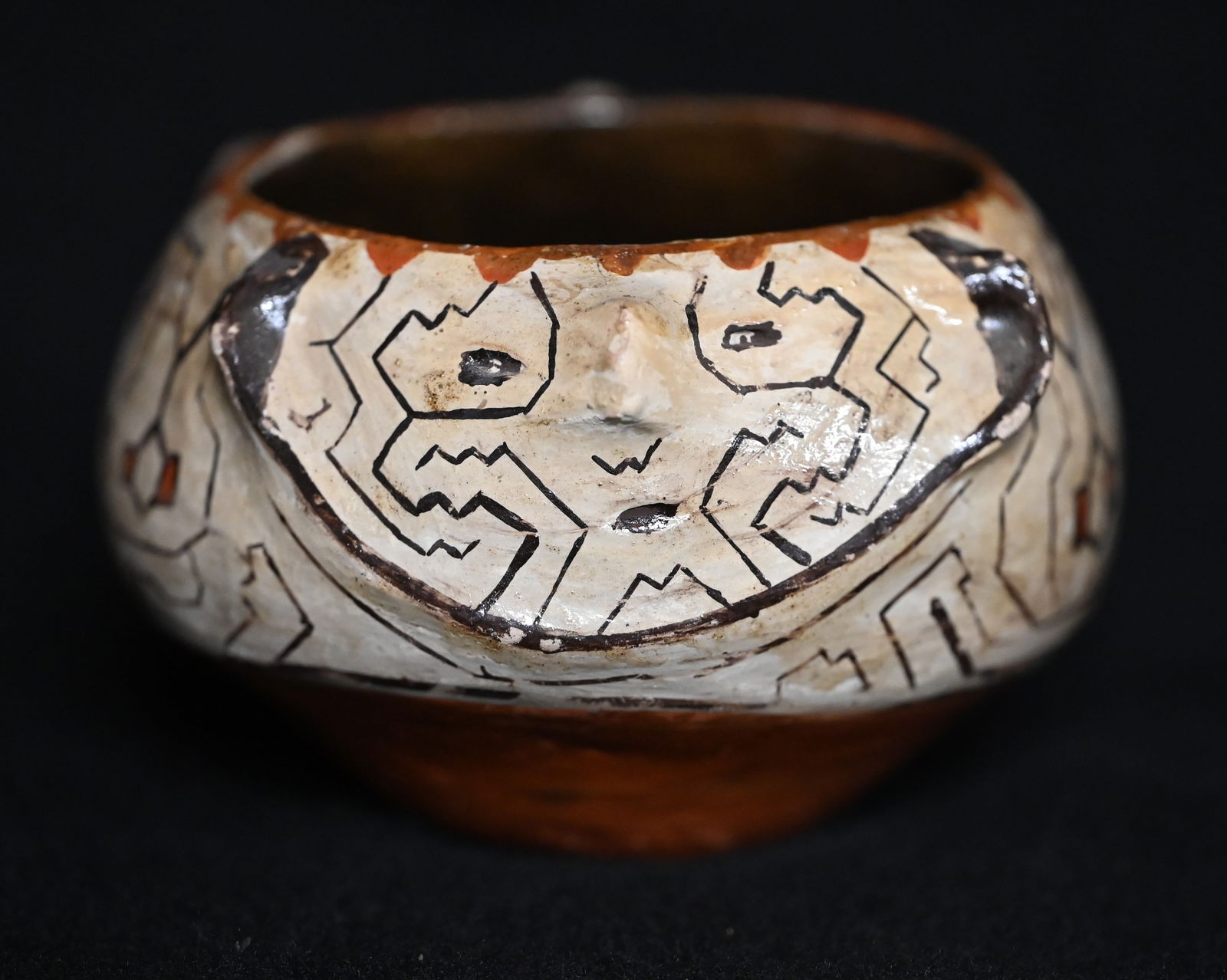 Small Peruvian Shipibo Face Pot.  Coil construction and hand painted intricate designs by the women (1 of 6)