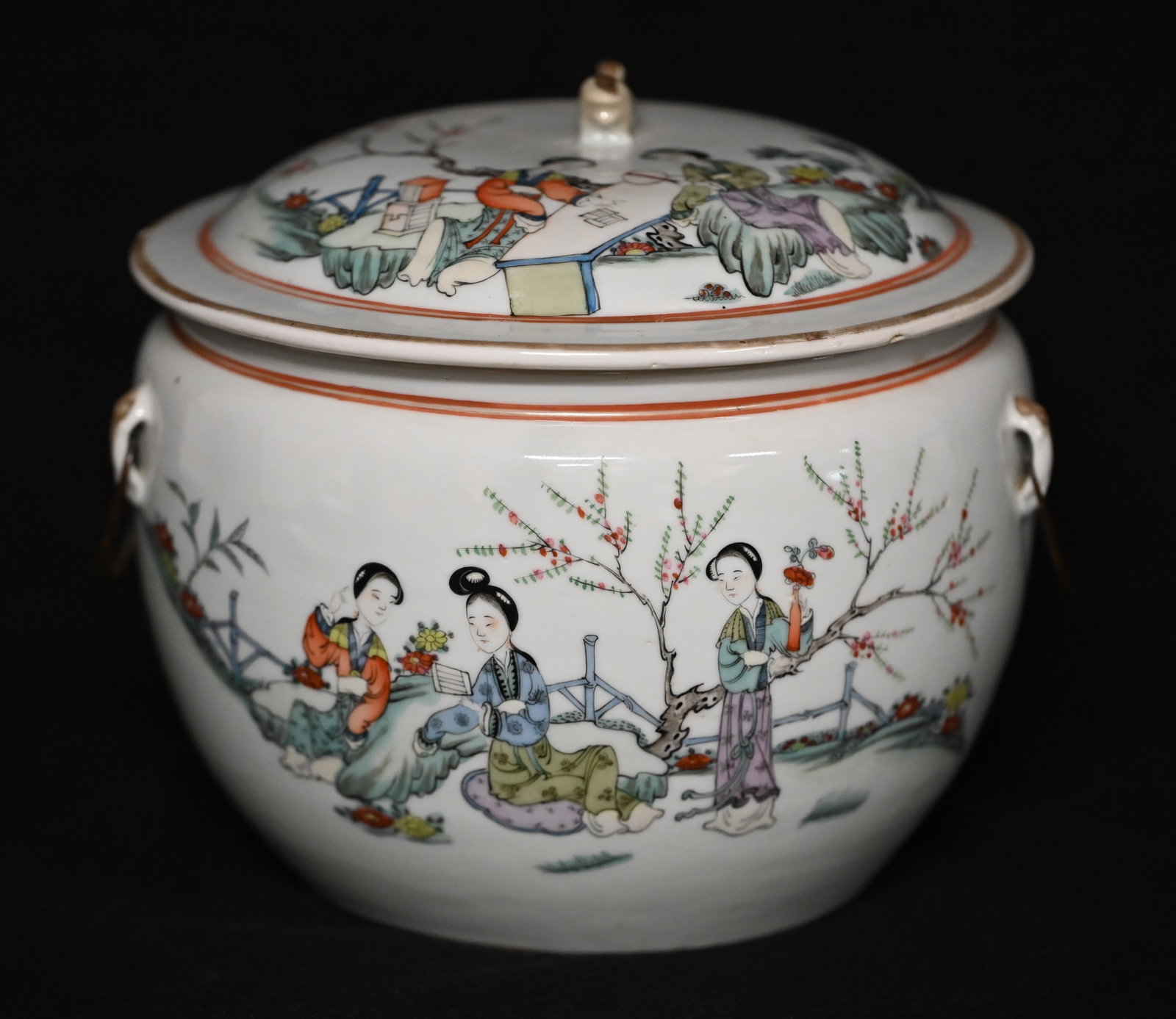 Chinese Ginger Jar Mid 1700's to 1800's Famille Ginger Jar. Finial of a Foo Dog on the lid. Hand: Chinese Ginger Jar Mid 1700's to 1800's Famille Ginger Jar. Finial of a Foo Dog on the lid. Hand painted scene of 3 women in a garden on the jar and 2 women playing a game on a table outside on the li