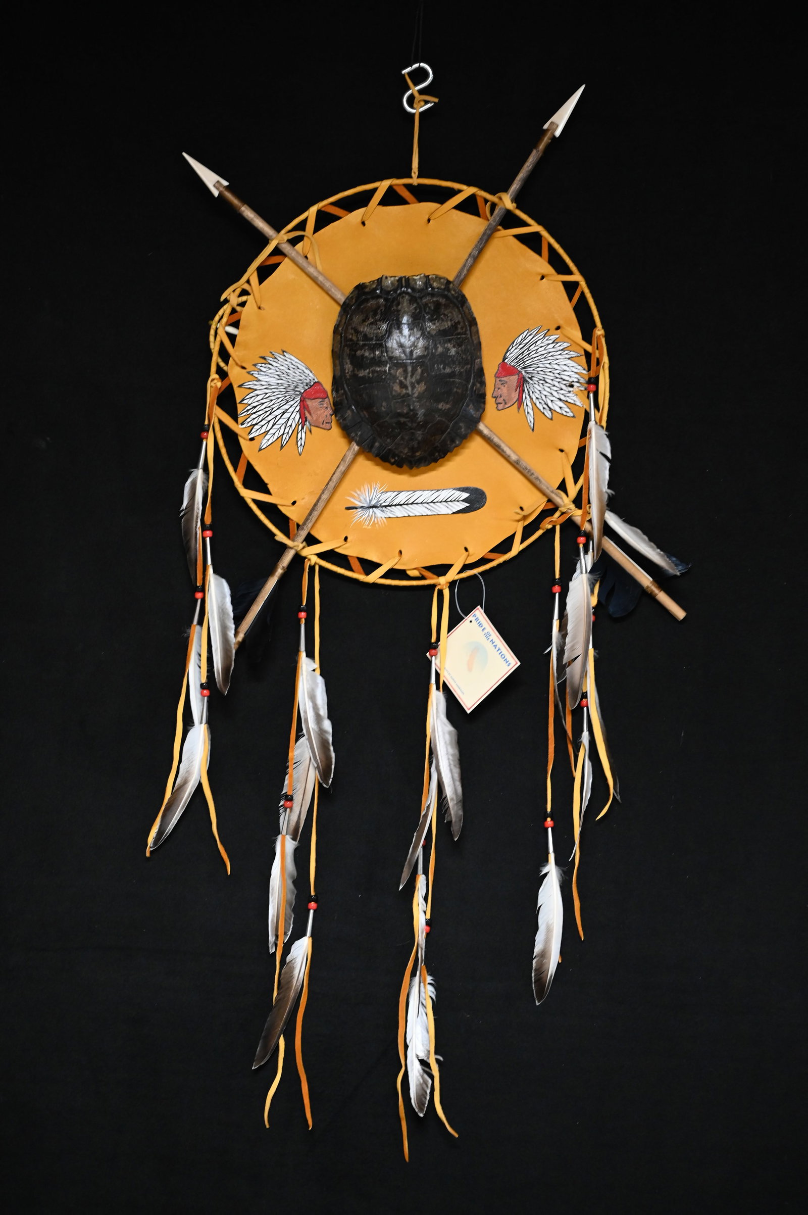 Native American Warrior Shield Hand Crafted by Native Americans Diameter is 15 inches. These would: Native American Warrior Shield Hand Crafted by Native Americans Diameter is 15 inches. These would of been hung on the side of their shelter for good Luck/Fortune. Ex: Pride of The Nations Store. The 