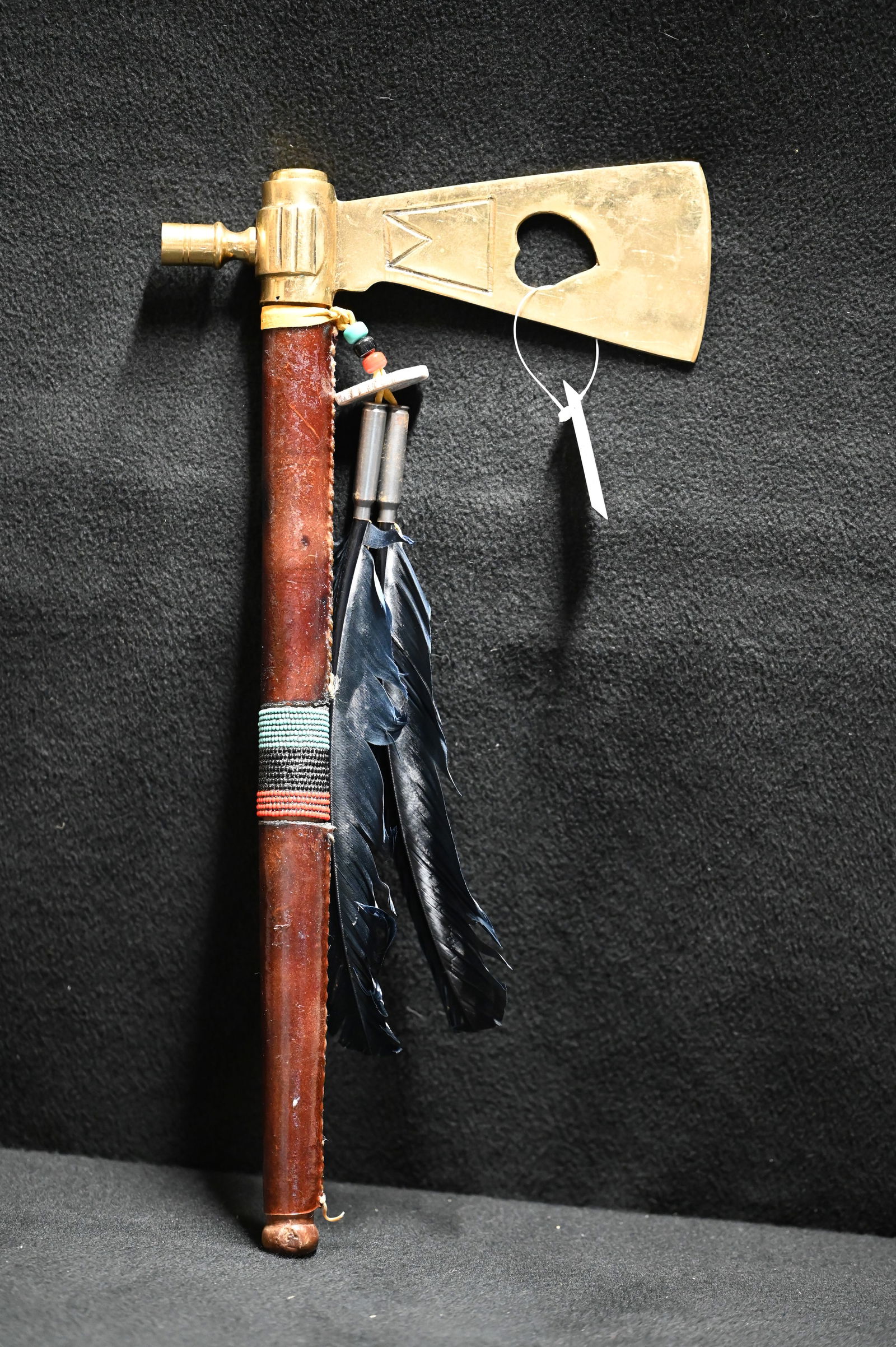16" Tomahawk Pipe with wood handle/stem wrapped in leather and beadwork with beaded feather drop.. (1 of 6)