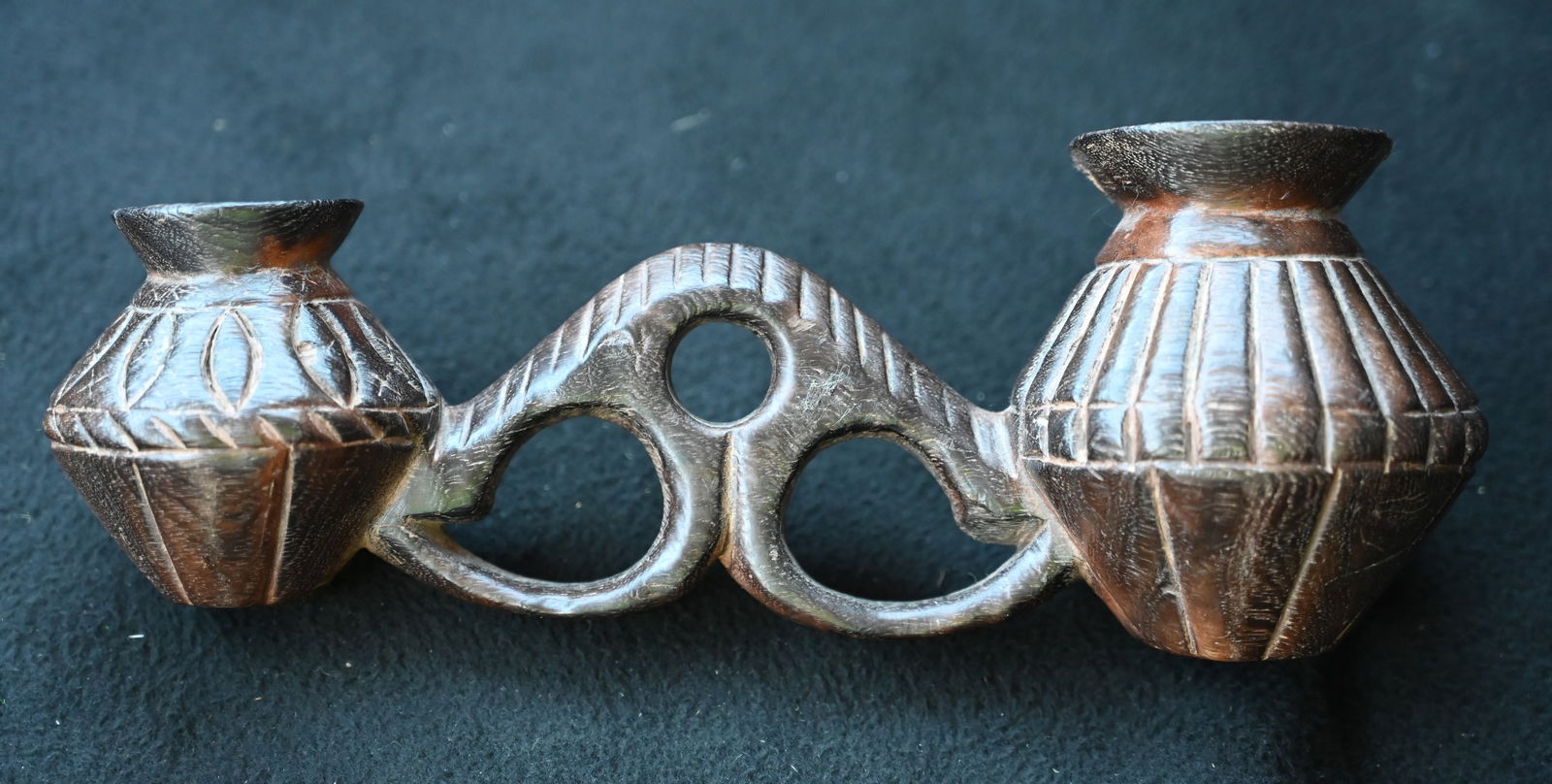 Fire Dancing Pots Hand Carved from one piece of wood from Africa. Measures 9 1/4 inches wide and 3: Fire Dancing Pots Hand Carved from one piece of wood from Africa. Measures 9 1/4 inches wide and 3 1/2 inches tall.