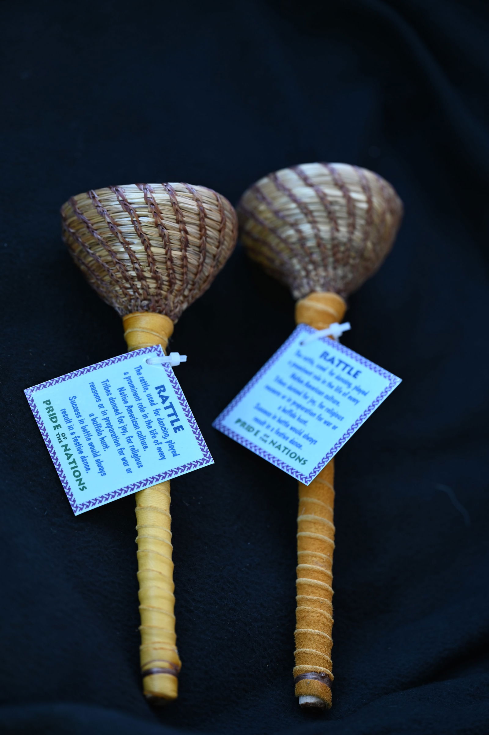 2 Hand Made 9" Wicker Rattles with leather wrapped wood handles.  Used in dance rituals. (1 of 4)