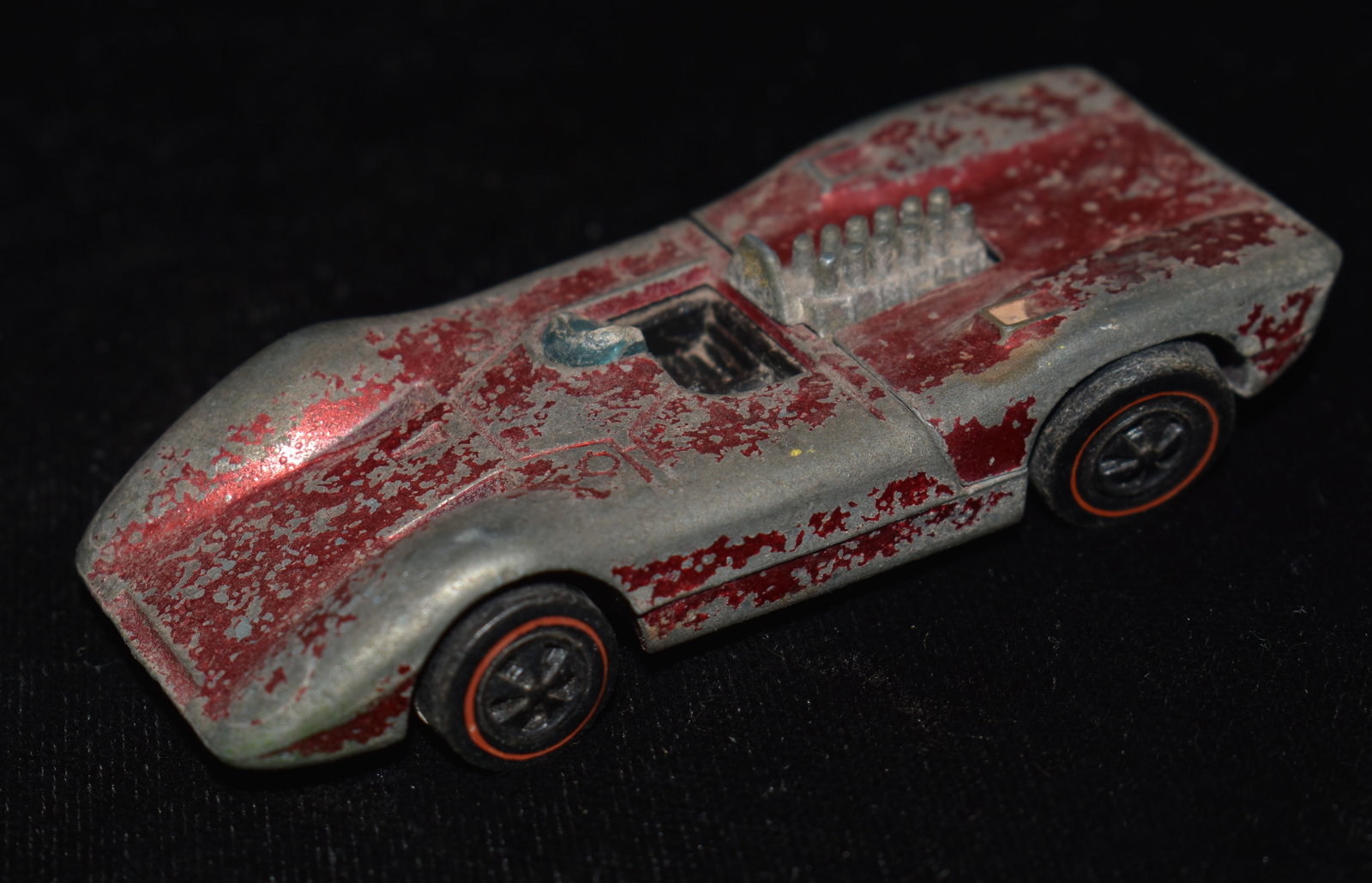 Hot Wheels Redline 1969 Ferrari USA Original Casting: Hot Wheels Redline 1969 Ferrari USA Original Casting. Very good condition for its age. Body is in great shape and rolls freely. Paint is half gone but is the original.