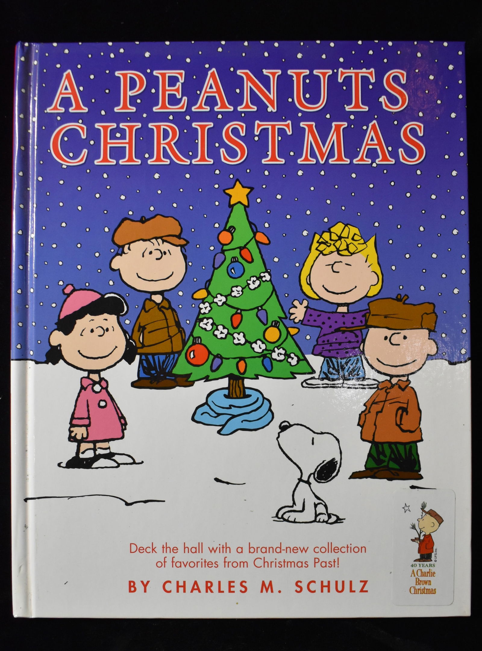 A Peanuts Christmas by Charles M. Schulz 2002 1st Edition: A Peanuts Christmas by Charles M. Schulz. Published by Ballantine Books, New York, 2002. 1st Edition. Fine or near fine condition hardback.