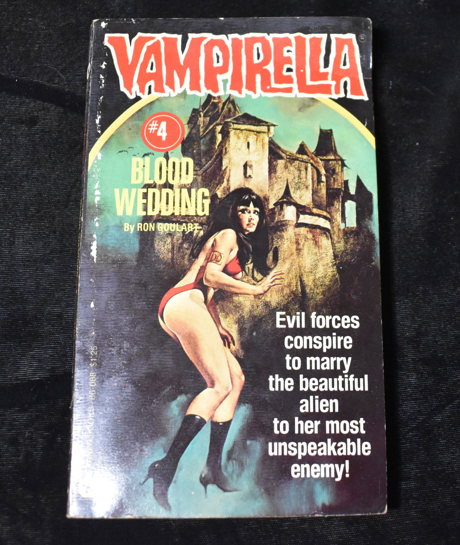 Vampirella #4 Blood Wedding by Ron Goulart 1st Printing: Vampirella #4 Blood Wedding by Ron Goulart. Published by Warner Books, 1976. 1st Printing. Very good condition softback. A little wear to cover.