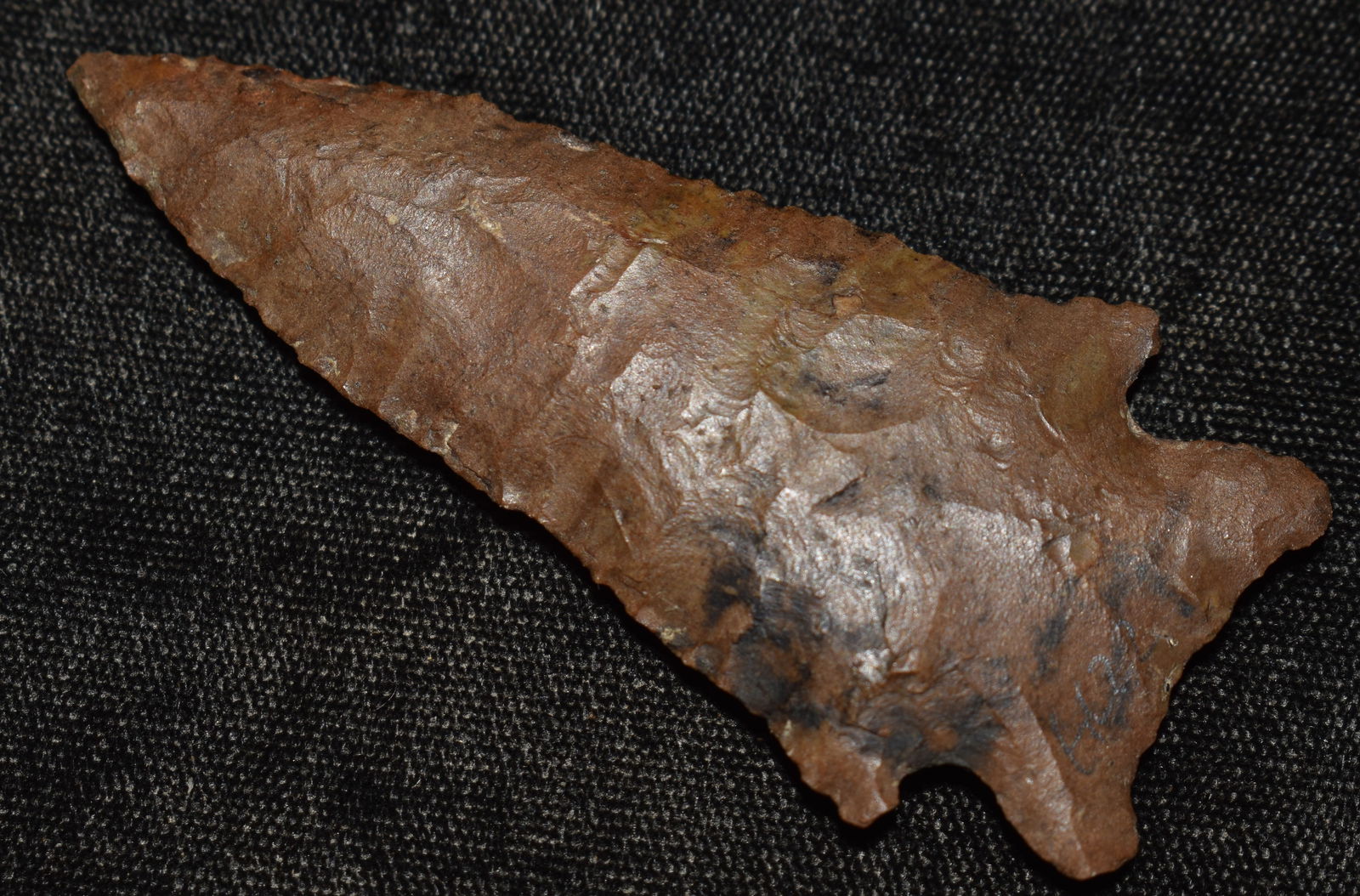 2 15/16" Finely Made Stillwell found in Benton County, Tennessee: 2 15/16" Finely Made Stillwell found in Benton County, Tennessee. Material looks very much like jasper. May be a very high grade of Buffalo River. From the life time collection of James Bond. Key word