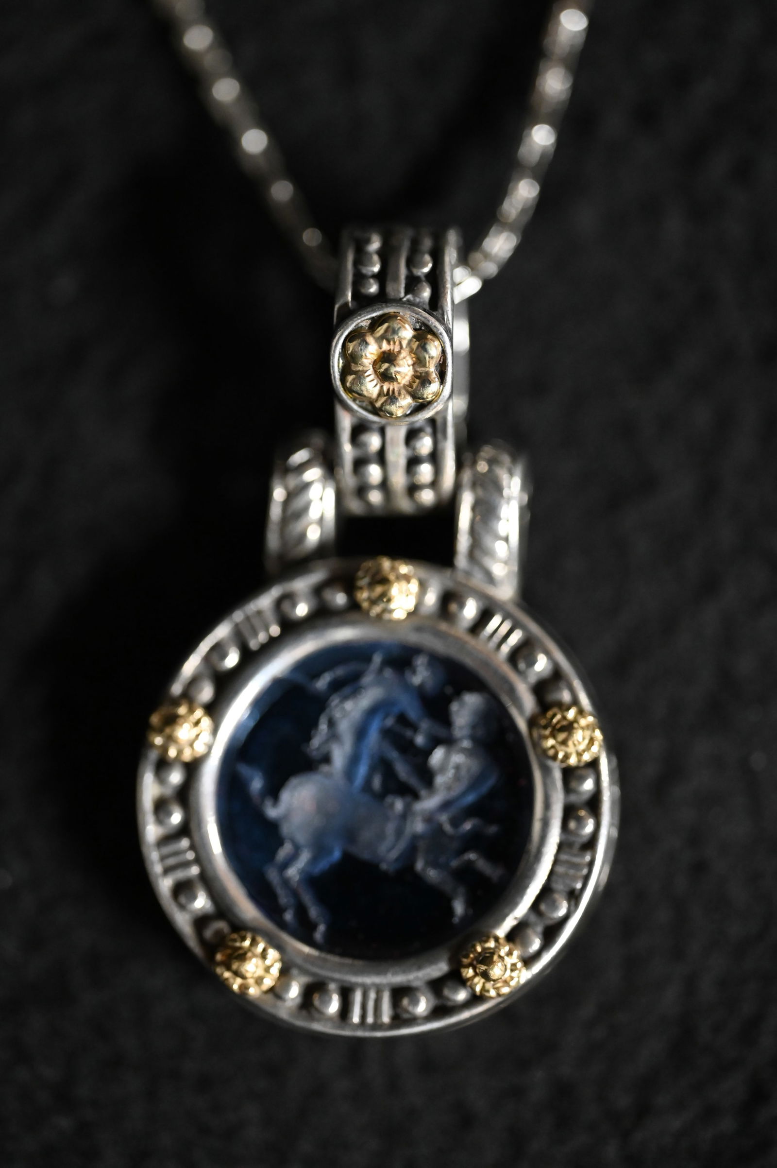 Fili Menegatti Italy 18K gold Sterling Pendant and 925 Chain: Necklace is Sterling Silver and a Fili Mengatti Pendant that is in 18Kt Gold with Sterling Silver with blue glass Intaglio Depicting Hercules Battling the Centaur Pendant is 1 1/8'' wide and 1 7/8'' t