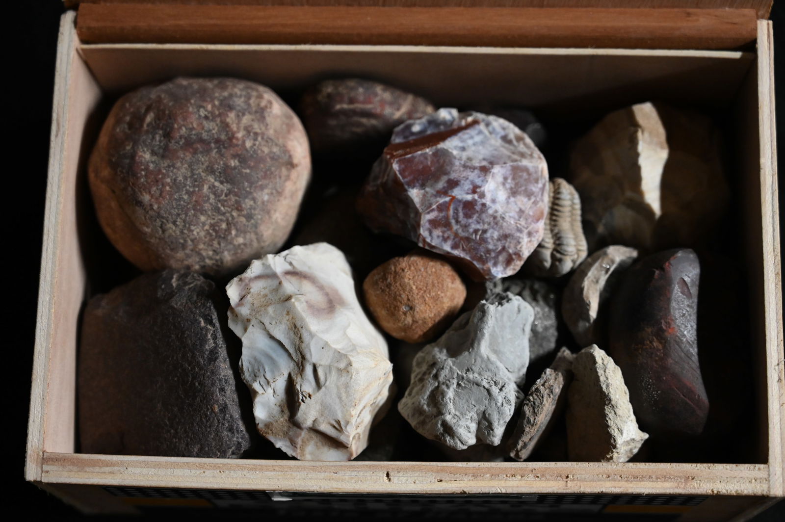 Cigar Box Full of Damaged Hardstone Artifacts, Chert Cores, Worked Hematite, Fossils and Pottery (1 of 6)