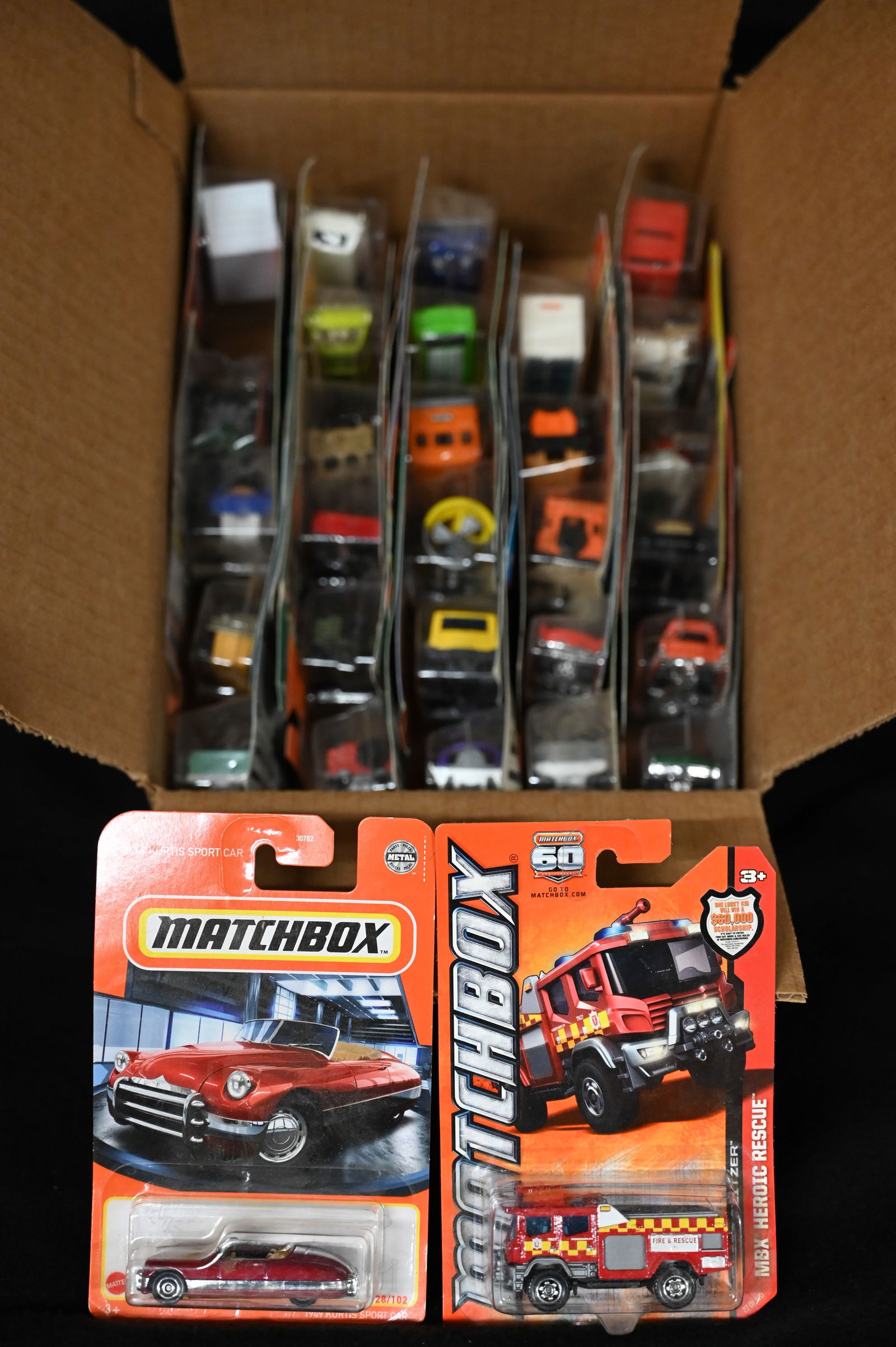 30 Matchbox Cars Assortment.  Mainly 2012 with a few other years included.  The cars are in their (1 of 3)
