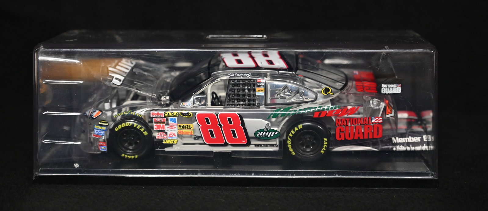 Dale Earnhardt Jr. "National Guard/Amp Energy" 1/24 Scale Diecast NASCAR Racecar in Hard Plastic: Dale Earnhardt Jr. "National Guard/Amp Energy" 1/24 Scale Diecast NASCAR Racecar in Hard Plastic Case.