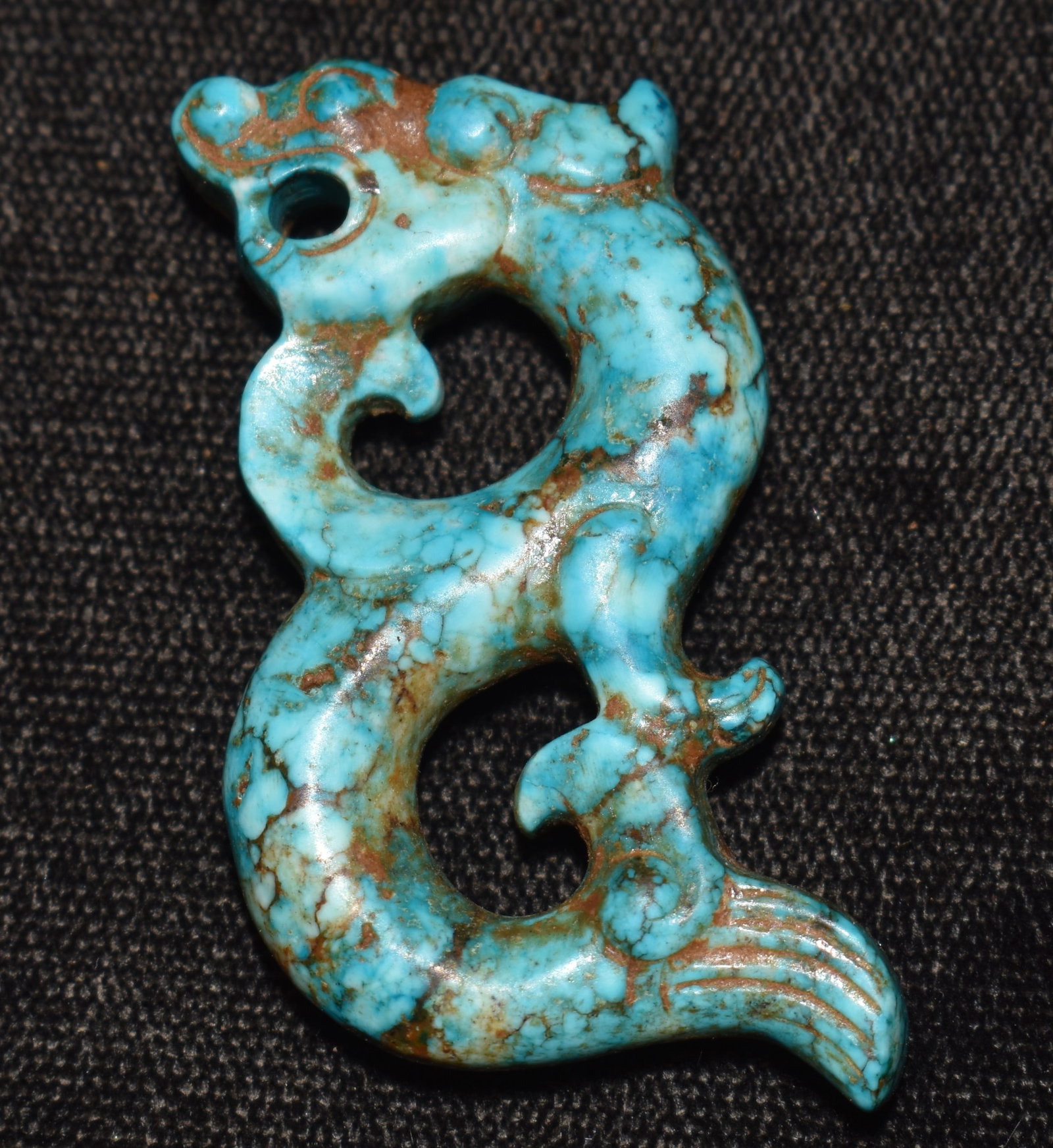 2" Turqouise Han Dynasty Dragon Pendant 202 BC – 9 AD, 25–220 AD: 2" Turquoise Han Dynasty Dragon Pendant 202 BC – 9 AD, 25–220 AD. Beautiful piece finely made from an attractive turquoise. Exhibits correct manufacture and good patination. Very nice piece of anc