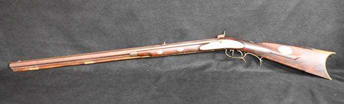 Half stock Muzzle Loader with Octagon Barrel Civil War Era.  Very fancy gun for its time.  Has