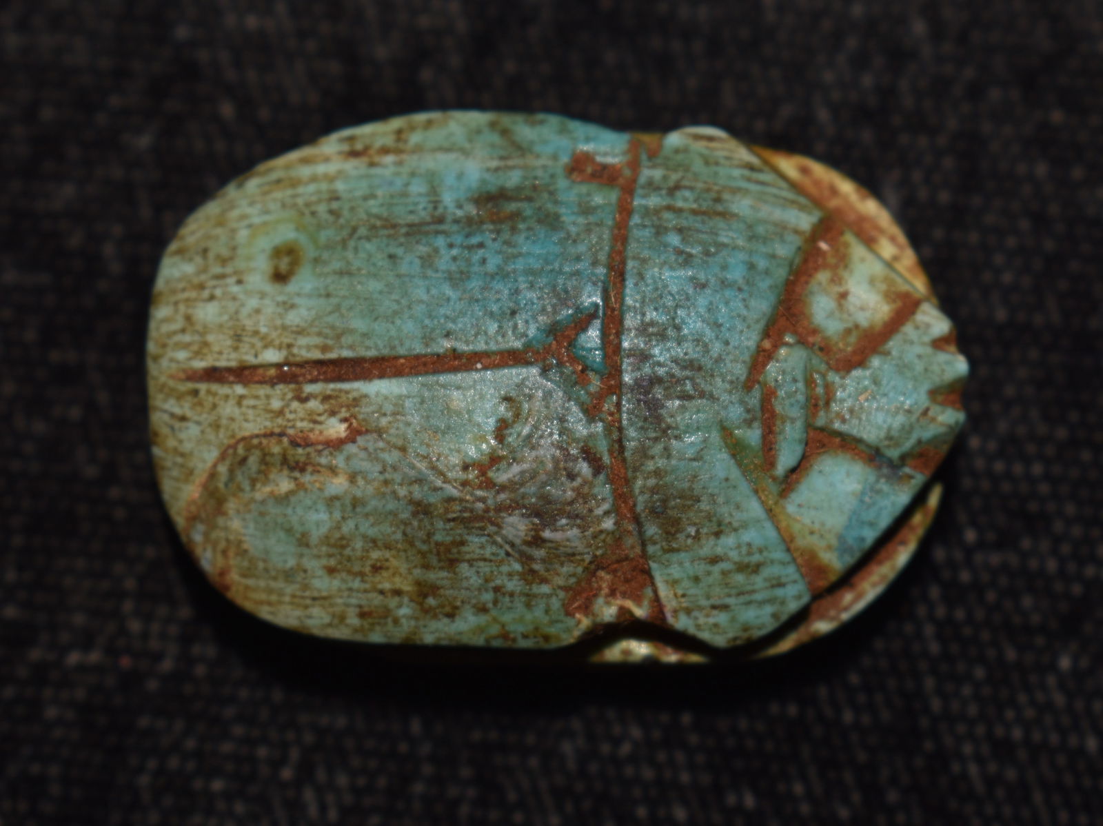 Ancient Egyptian Antique Glazed Faience Scarab Beetle Seal Amulet 600 - 300 BC: Ancient Egyptian Glazed Faience Scarab Beetle Seal Amulet 600 - 300 BC. Good condition for its age and made with nice detail and Egyptian hieroglyphics carved in to the base. Measures 1 1/8"