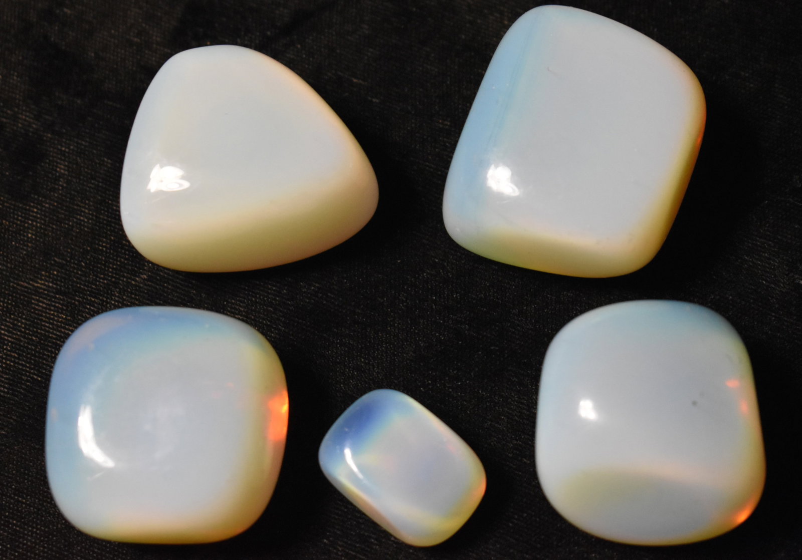 5 Polished Rainbow Moonstones from Peru - Jewelry Grade: 5 Polished Rainbow Moonstones from Peru. Nice size samples suitable for jewelry making projects. These measure 7/8" to 1 1/2" with thicknesses of 5/8" to 1". Found in the Andes of Peru. 8 1/2 ounces