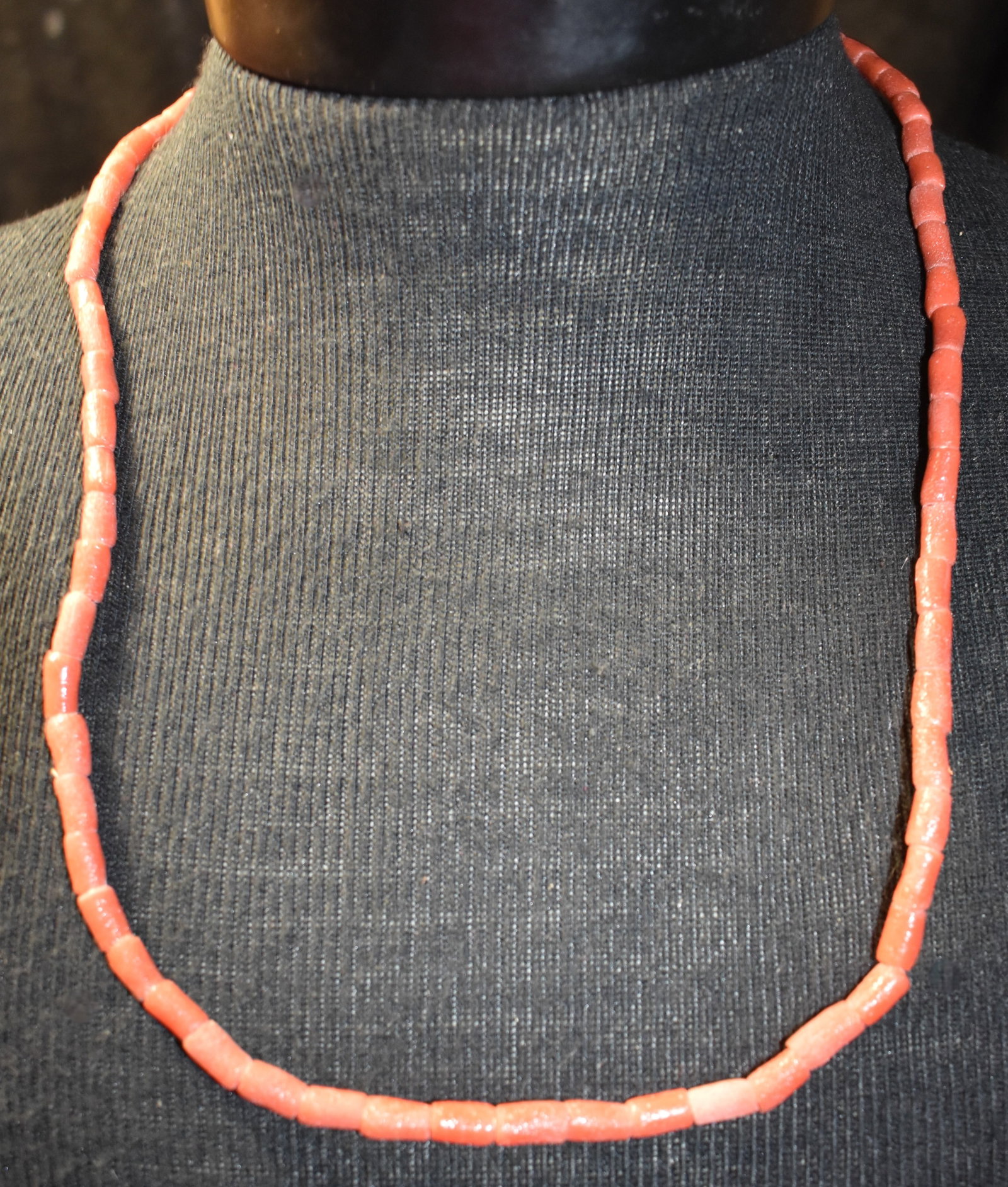 Coral Sandcast Beads made in Ghana, Africa. 73 Bead strand: Coral Sandcast Beads made in Ghana, Africa. 73 Bead strand