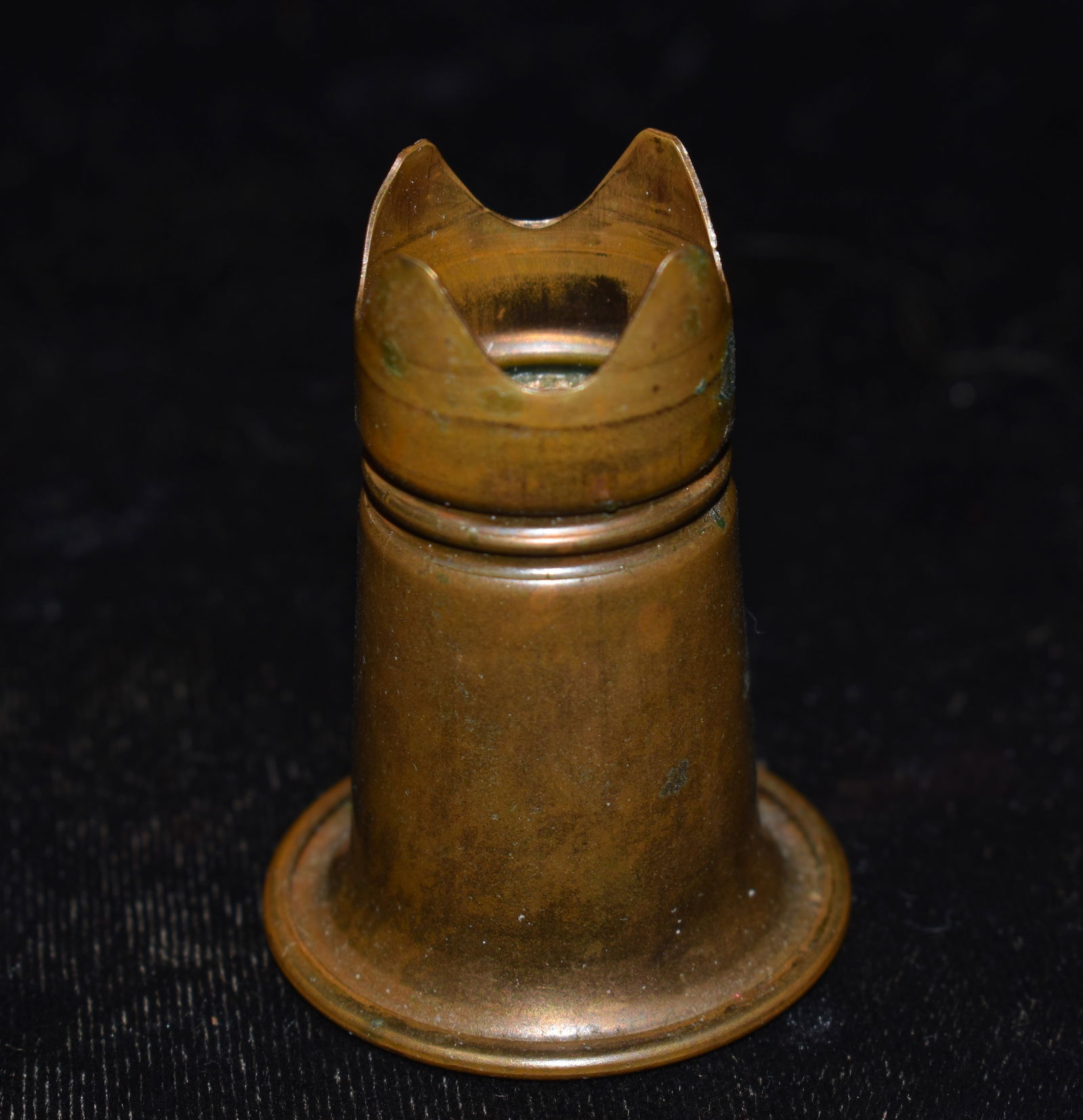 WW2 Trench Art Candlestick/Chess Piece made from a 20mm Round which was much smaller and had to be: WW2 Trench Art Candlestick/Chess Piece made from a 20mm Round which was much smaller and had to be stretched to be turned into this form. Stands 1 7/8" Tall and 1 3/8" Wide Circa 1940's.