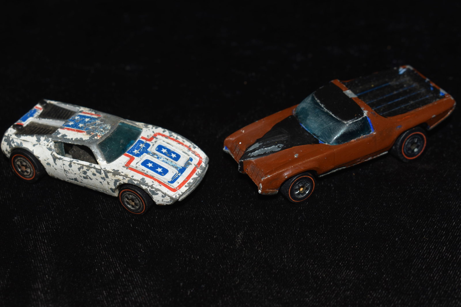 1975 Mattel Hot Wheels Redline Warpath & 1973 Breakaway Bucket: 1975 Mattel Hot Wheels Redline Warpath in White with Red and Blue Stars & Stripes. Made in Hong Kong. A lot of wear to the paint. Otherwise very good condition. Breakaway Bucket had a new paint job at