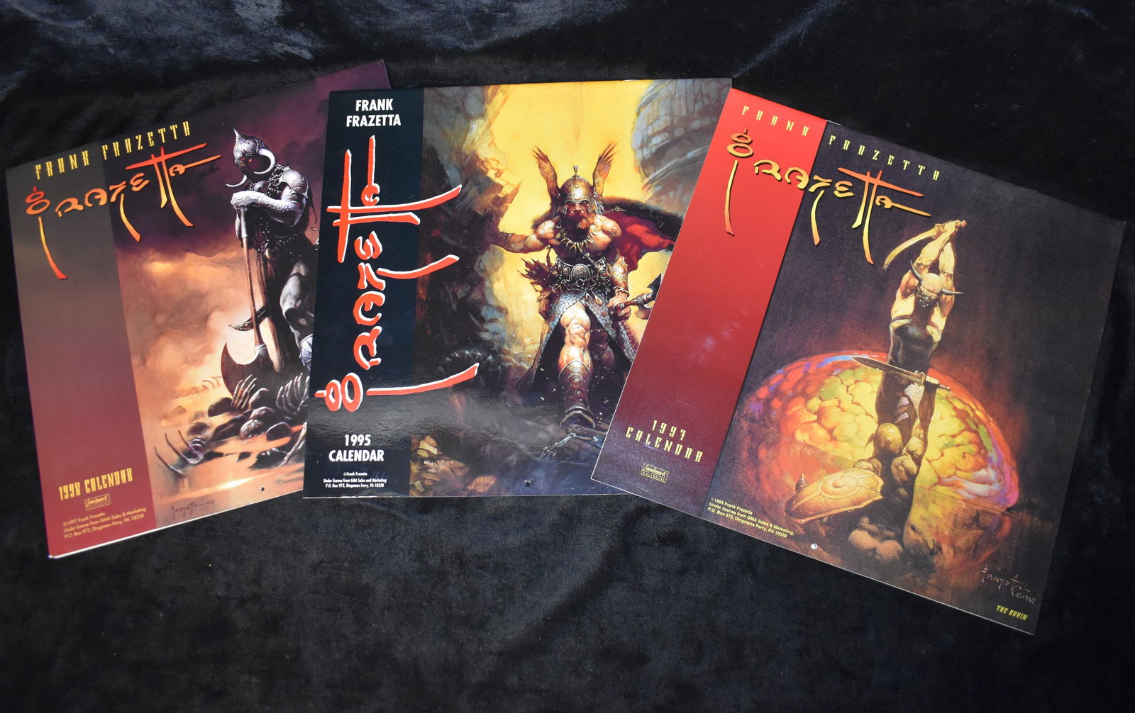 FRANK FRAZETTA 1995, 1997 & 1998 LANDMARK CALENDAR's: FRANK FRAZETTA 1995, 1997 and 1998 LANDMARK CALENDARs. Like new condition. 12" by 12"
