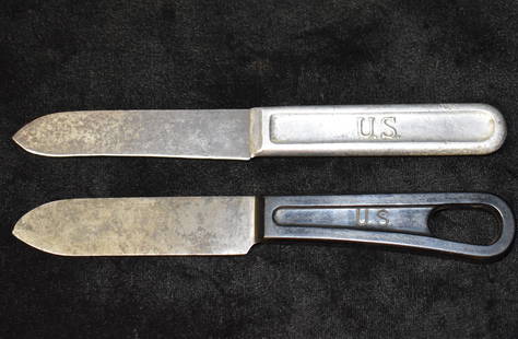 WWI and WWII Mess Kit Knives - 1917 & 1941: US M1910 WW1 Mess Knife LF & C 1917 Landers Frary & Clark and US Military WWII Mess Kit Knife 1941 LF&C. Both were heavily used in their time but are still intact. Both measure 7 1/4 inches.