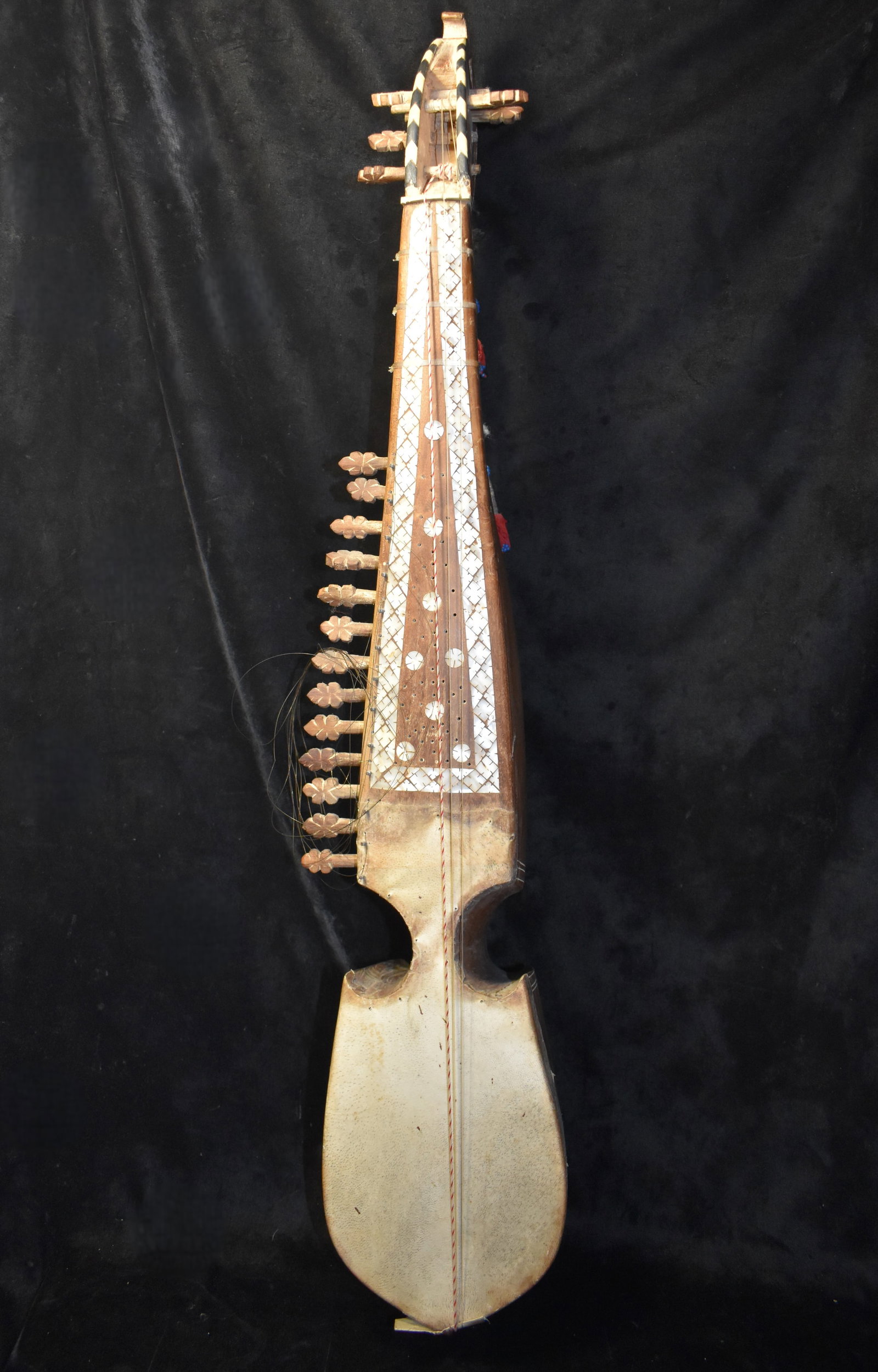 Elaborate Inlayed Traditional Folk Musical Instrument Rubab Robab Rabab: Traditional Folk Musical Instrument Afghanistan Rubab Robab Rabab with mother of pearl inlay. Hand crafted from wood with intricate mother of pearl inlay and accents. Needs new strings but is in excel
