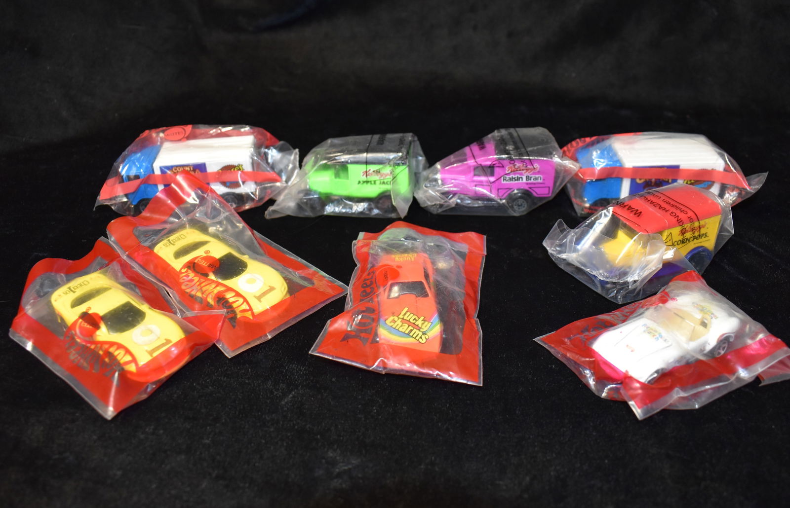 9 Hotwheels and Matchbox Cereal Promotional: MATTEL HOT WHEELS Lucky Charms die cast car 1975, CINNAMON TOAST CRUNCH 1982, CHEERIOS 1992 x2, Coco Puffs Truck 1991 x2, MATCHBOX KELLOG's Trucks APPLE JACKS, RAISIN BRAN and CORN POPS 1989. All are