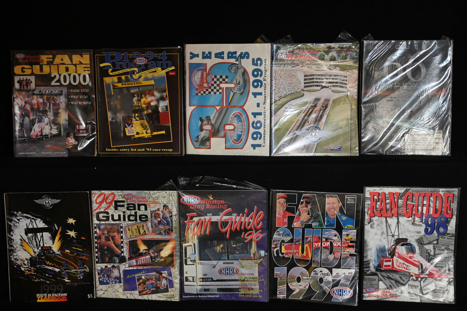 10 NHRA Fan Guides From the 90's. Some have several driver signatures and ticket stubs from race: 10 NHRA Fan Guides From the 90's. Some have several driver signatures and ticket stubs from race events.