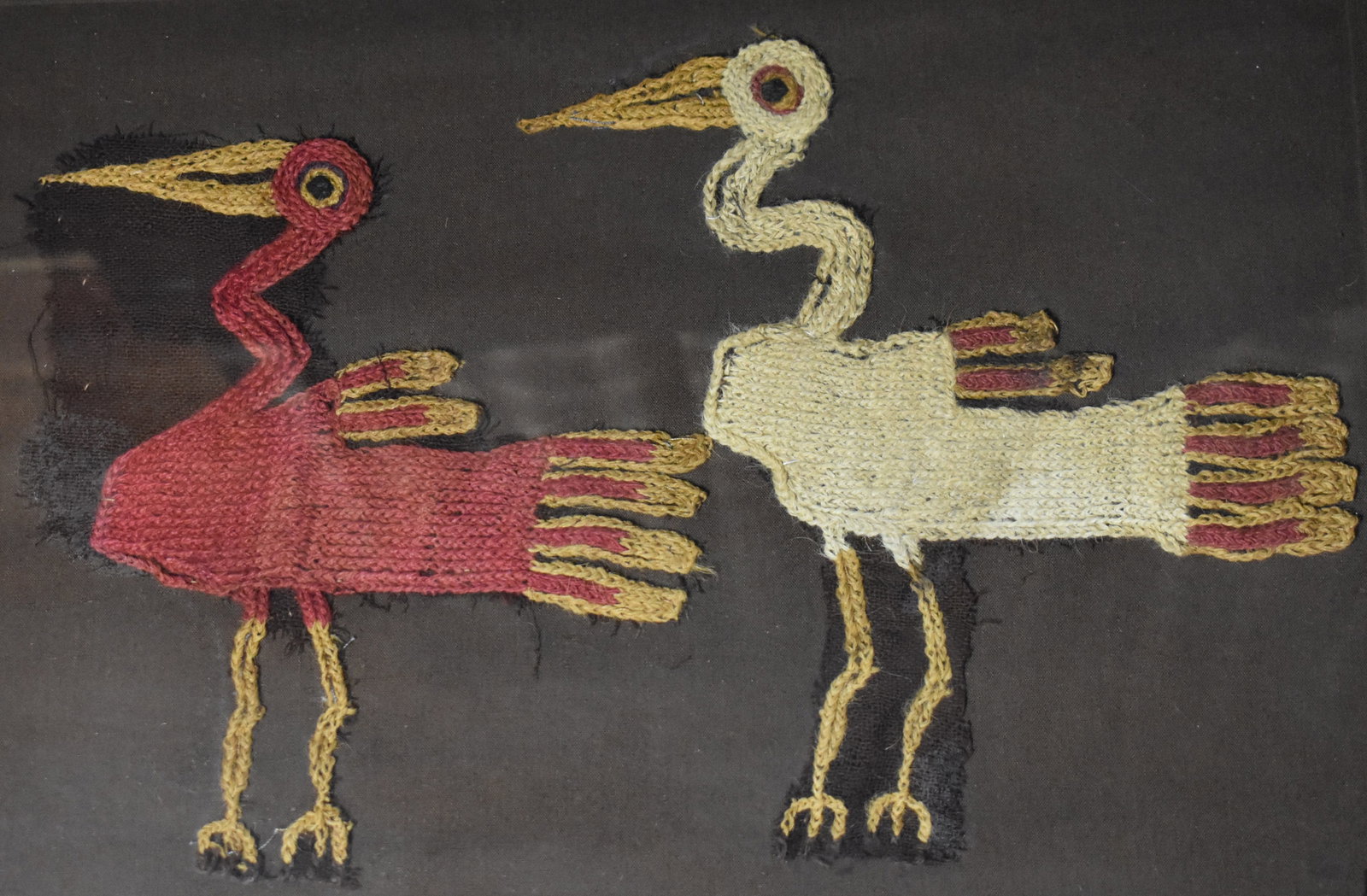 2 Nasca Ornithomorphic Embroideries Made by the Nasca 200 BCE to 600 CE: 2 Nasca Ornithomorphic Embroideries Made by the Nasca 200 BCE to 600 CE. Colorful examples of the traditional textiles made by the Nasca people from the Andes in Peru. They are made of camelid fibre a