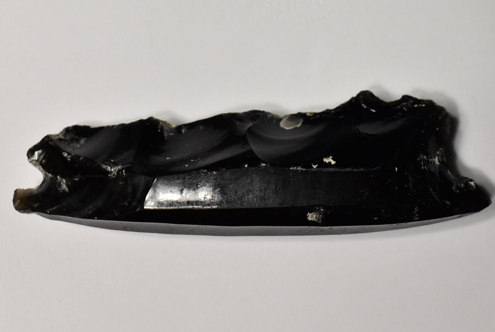 4" Pre-Columbian Obsidian Blade Core Made in to an Eccentric: Pre-Columbian Obsidian Blade Core Made in to an Eccentric. In pre-Columbian cultures obsidian blades were made from obsidian. The cores were an end result of this blade manufacture. This core is inter