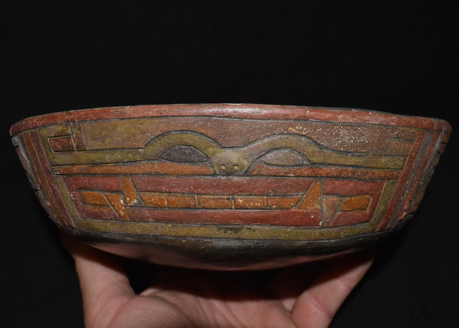 Pre-Columbian Pre-Incan Paracas Ornate Pottery Bowl 300 BC to 200 AD: Pre-Columbian Pre-Incan Paracas Ornate Pottery Bowl. This piece has had professional restoration. Was likely in pieces and reconstructed. Measures 8 1/2" Diameter and 2 3/4" tall. Ex Dan Stroud and Ri