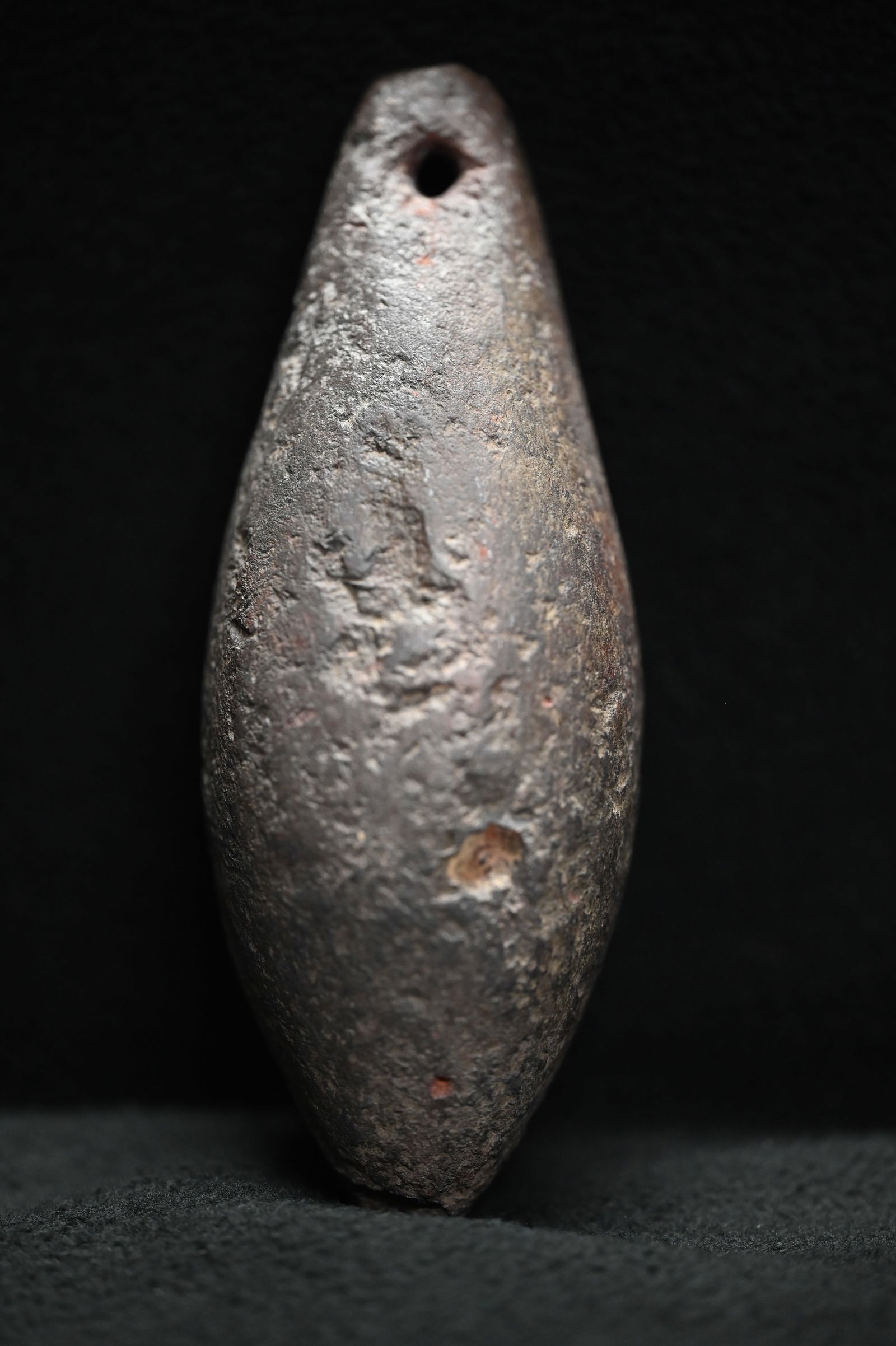 5 1/8" Exceptional Hematite Drilled Plummet Found in St. Charles Co. Missouri. Comes with a Roy: 5 1/8" Exceptional Hematite Drilled Plummet Found in St. Charles Co. Missouri. Comes with a Roy Motley COA Ex: James Vroom Collection.