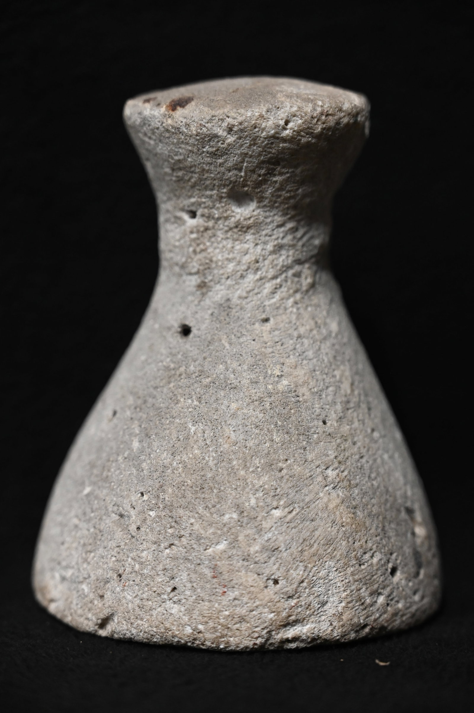 4 1/2" Sea Coral Poi Pounder Found in the Polynesian Islands Region 3 5/8" wide. Made from a basalt: 4 1/2" Sea Coral Poi Pounder Found in the Polynesian Islands Region 3 5/8" wide. Made from a basalt material. Poi is a traditional staple food in the Polynesian diet, made from taro. Traditional poi i