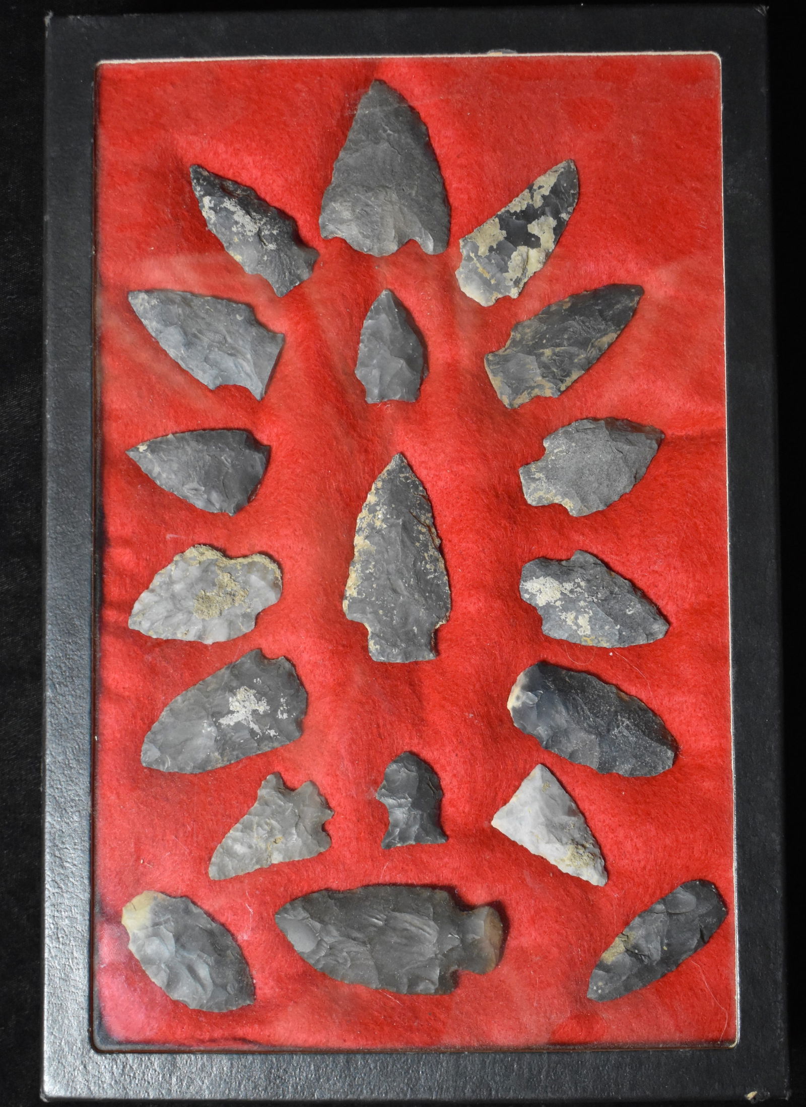 Frame of 19 Arrowheads Found in the Midwest: Frame of 19 Arrowheads Found in the Midwest. These appear to be from Kansas, SW Missouri or Oklahoma. Part of an inherited collection so we are having to guess on this group. They have a heavy patinat