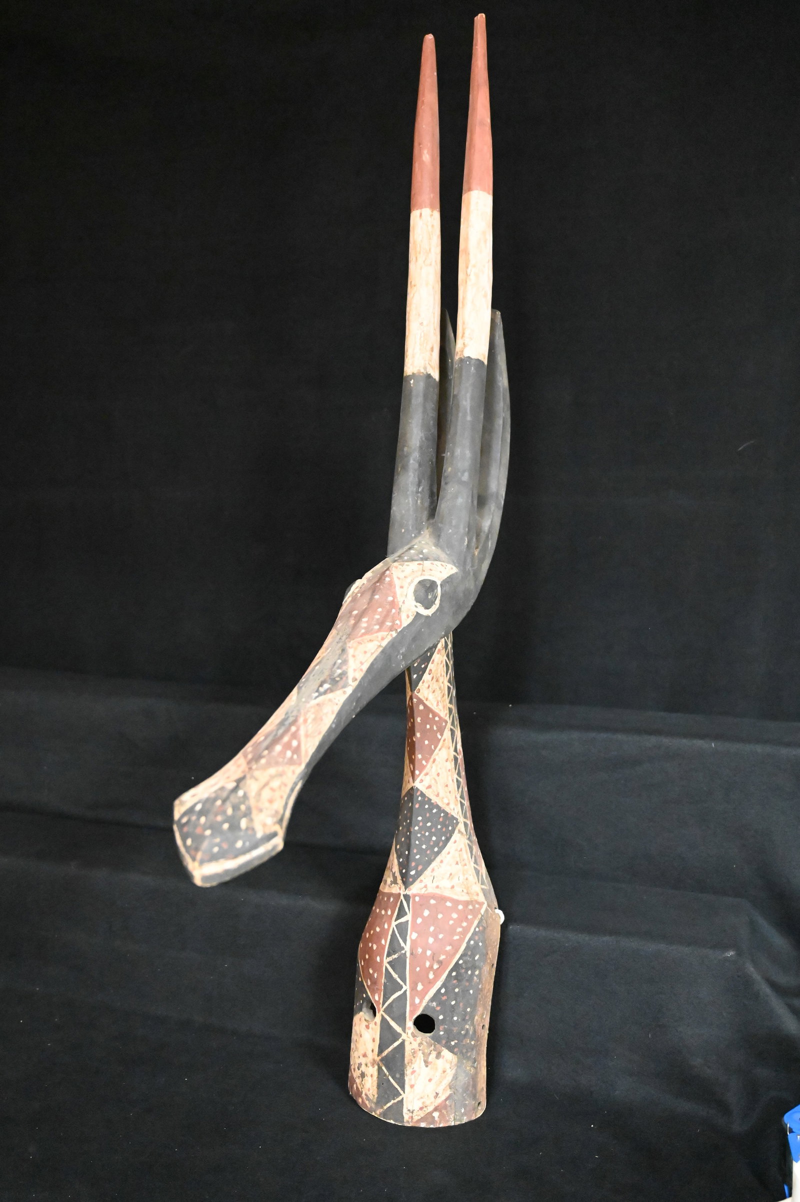 Kurumba Adone Antelope Mask Pre-Colonial made by The Kurumba People of Africa.: Kurumba Adone Antelope Mask Pre-Colonial made by The Kurumba People of Africa. Measures 42 inches long 5 1/4 inches wide 21 inches tall. Pre-colonial styles were painted with geometric designs in natu