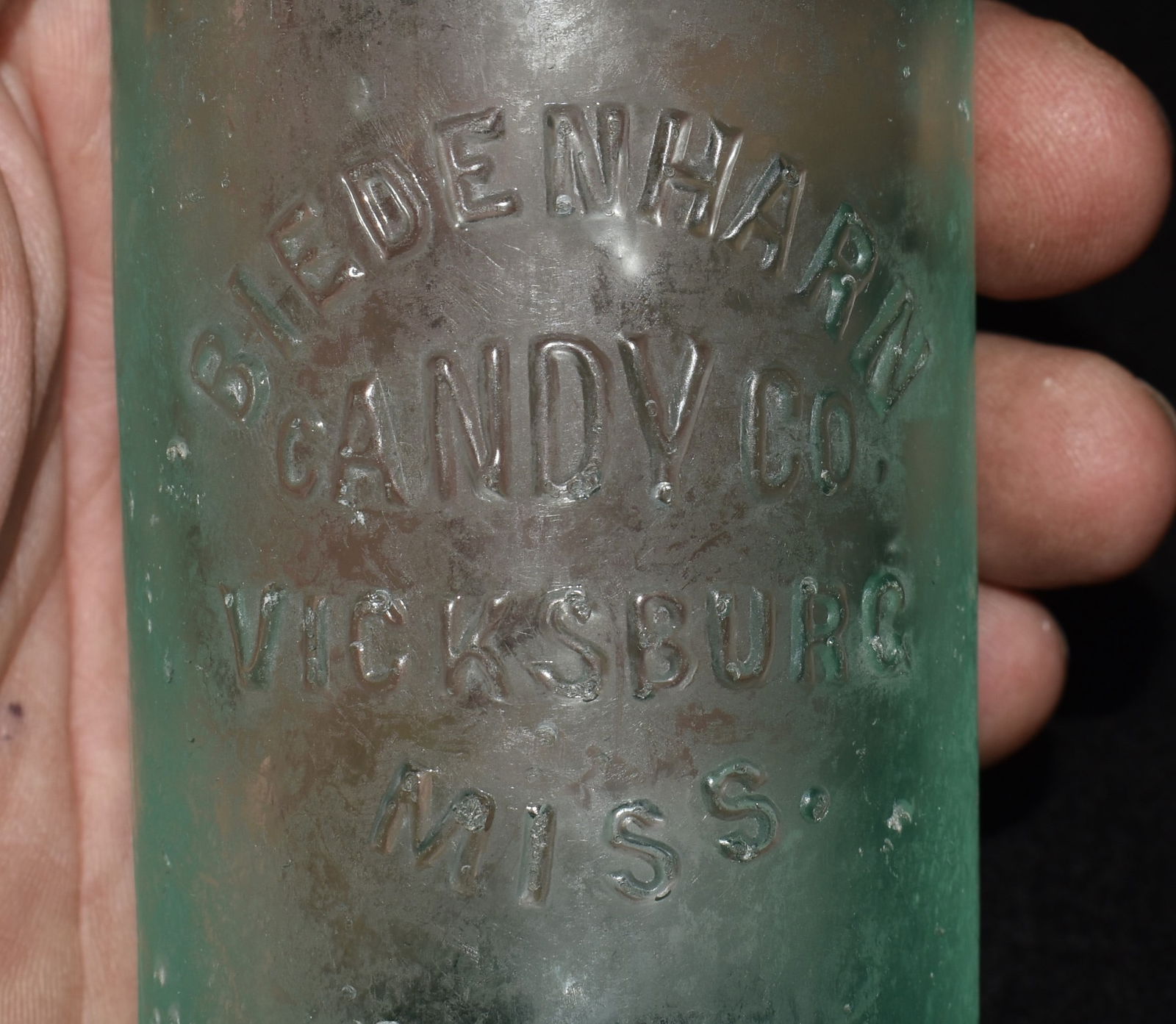 1890's Coca Cola Crown Top Bottle Biedenharn Candy Company - Vicksburg, MS: The Biedenharn Candy Company in Vicksburg, Mississippi, holds a special place in history as the first place where Coca-Cola was ever bottled. In 1894, Joseph A. Biedenharn, a candy store owner, began